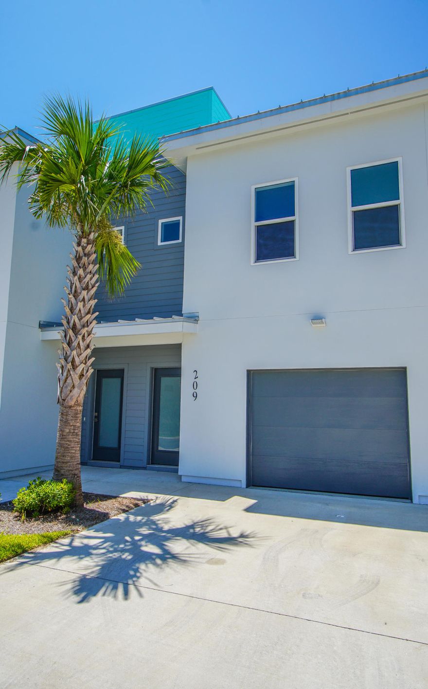 NEW CONSTRUCTION!!!! Sound Side Lofts, your new waterfront development. This project is comprised of 20 units with modern and lofted ceilings over looking the intracoastal waterway. Situated in a quaint golf cart community, these town homes each boast their own boat slip, garage, and upscale finishes. Located within walking distance to the world famous white sand beaches, and a short boat ride away from the world famous crab island. Come and relax at the new Sound Side Lofts and experience what this destination has to offer. This unit will be in the second phase just off the water.