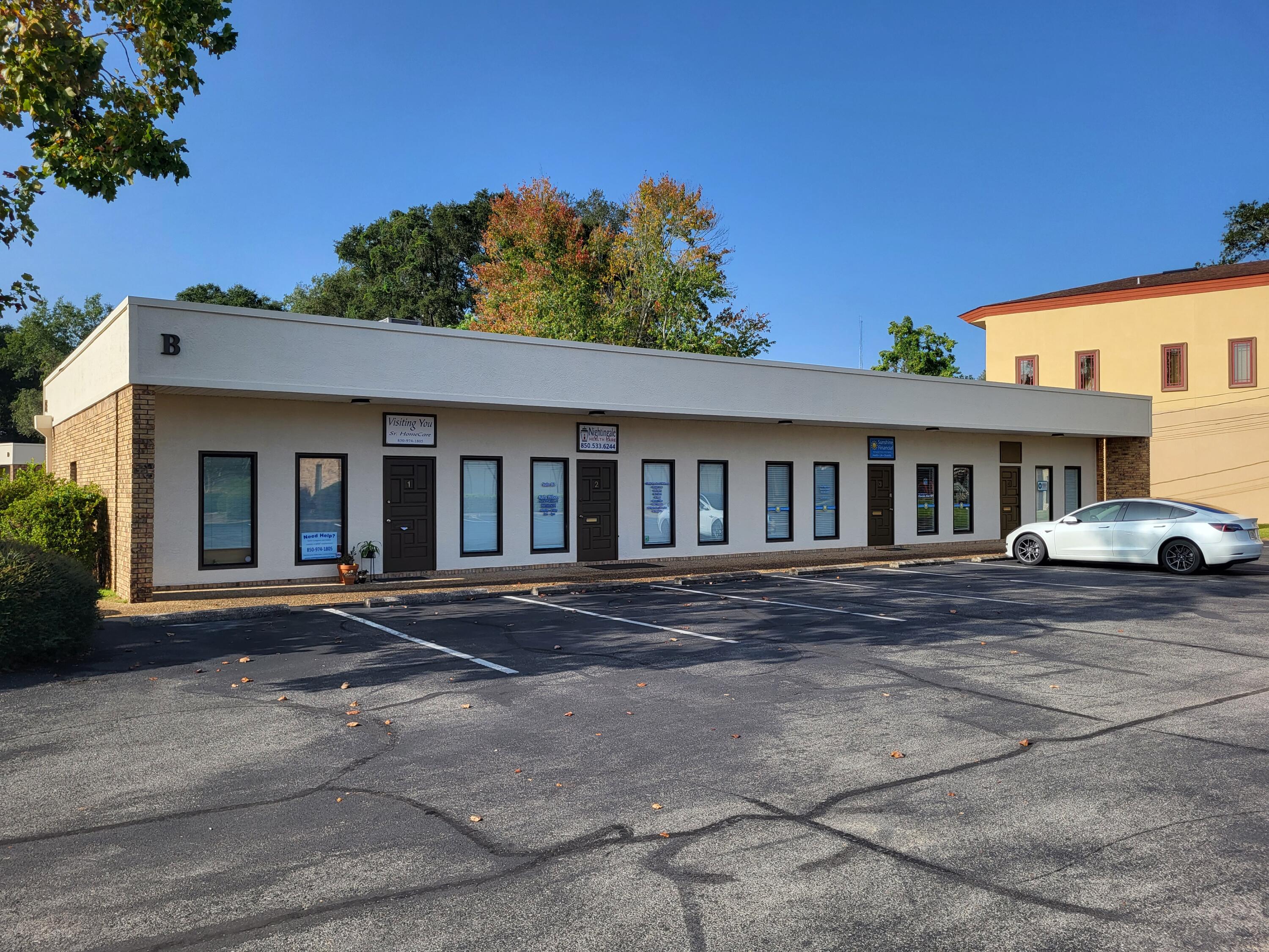 2 private offices, reception area, coffee bar, restroom, storage closet, front and rear entrance.