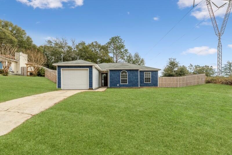 Don't miss out on this beautiful and updated move in ready home, that has all the charm outside and inside. Walk in the front door to the open living space, then into your galley kitchen with a great dining space. Counters in kitchen and spare bathroom are solid surface counters. Walkdown the hall to 2 spare rooms and the spare bathroom with tub/shower combo. The master bedroom is spacious with plenty of closet space, walk into the master bath with a marble countertop and a beautiful spa like walk in shower. A section of the .61 acre is fenced in with the home. Front shake siding is brand new, and so is vinyl trim around home. Homeowner putting a newer water heater in home. This beauty will not last long, definitely a hidden gem on south end of town.