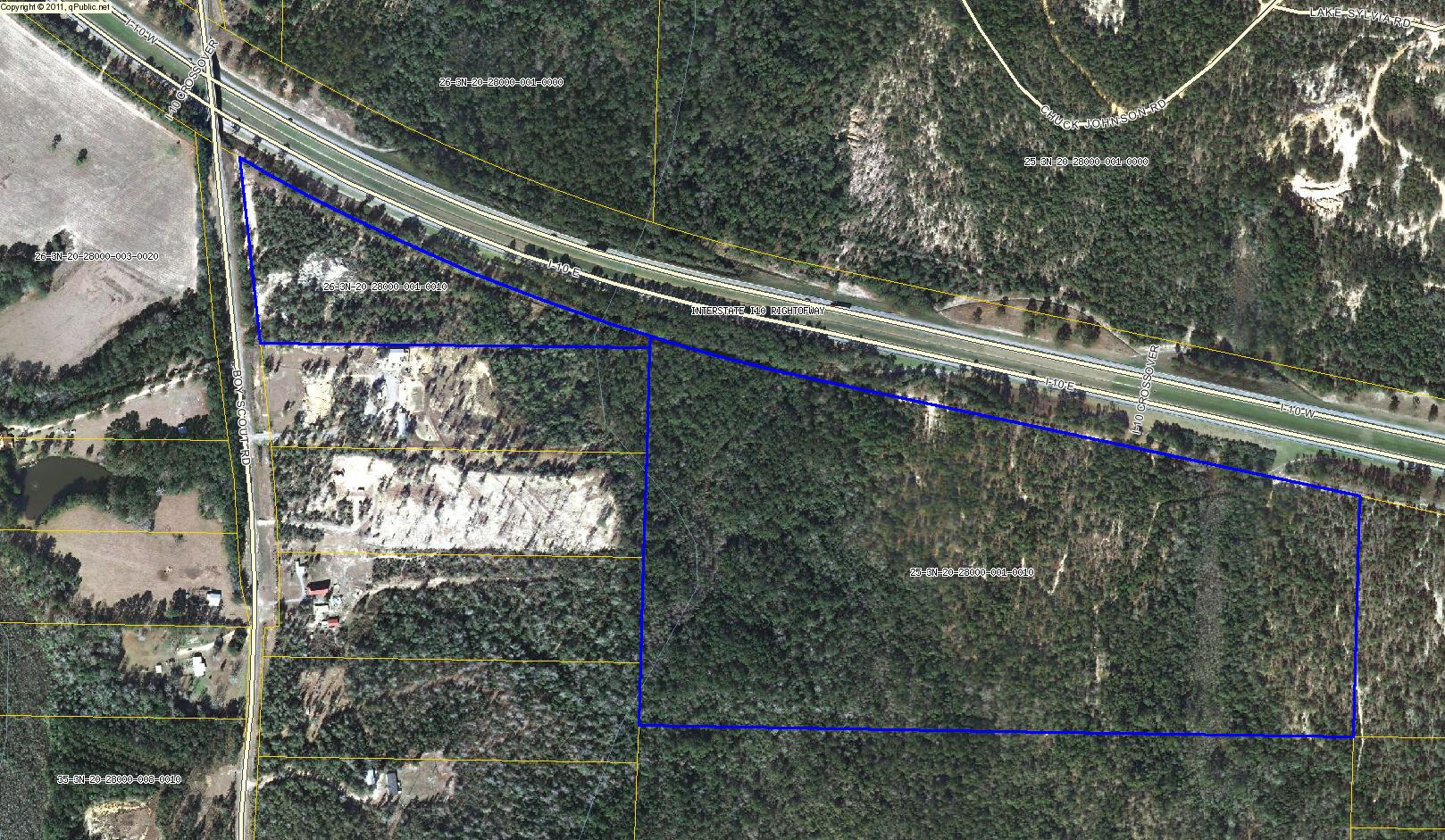 Distressed Sale. 86 acres located off Boyscout Rd, along the edge of I-10. 2 connecting parcels with entry on Boyscout Rd. Abundant with mature trees and wildlife. Perfect for hunting. Bishop Branch Creek meanders through property. Trails throughout property. Smaller parcel off Boyscout Rd: 263N20280000010010. Sale subject to 3rd party approval.