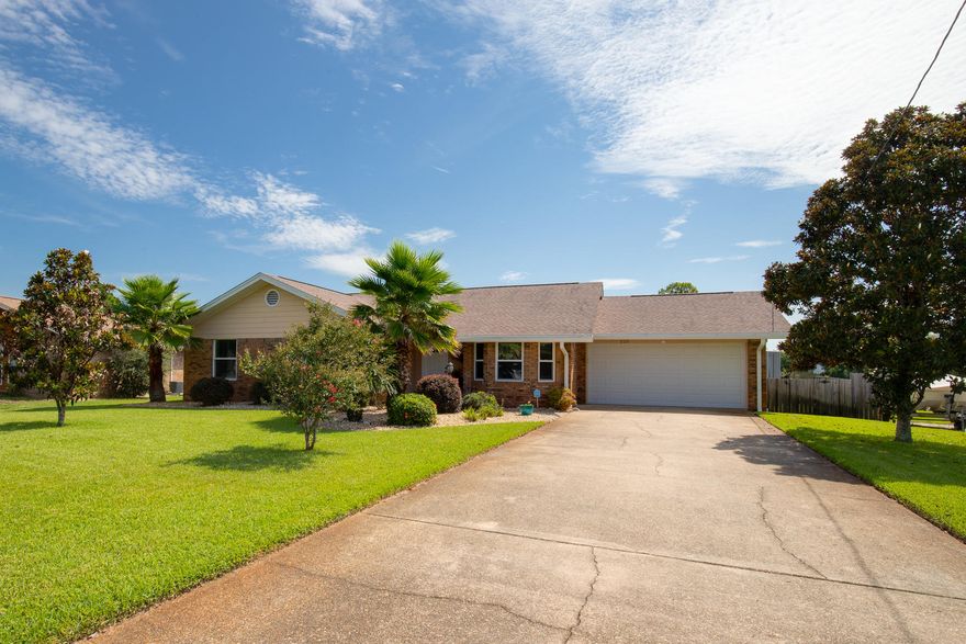 Fantastic Lakefront Pool home boasts beautiful step down living room w/vaulted wood plank ceilings & whitewashed rounded brick fireplace, Updated kitchen, Master bath entry sliding barn door, Lg. Master BR has access to stunning large deck that overlooks peaceful creek fed Timber Lake. The open deck area has ''shade'' pergola for outside dining. Covered screen enclosed deck has built in bench seating and a Handmade Tiki bar for relaxing by the pool and lake...bug free! Upgrades Galore includes: 2018 Full Screen Pool enclosure, 2009 Roof, 2020 pool pump, 2016 exterior doors, windows, garage door, sliding glass door. Easy maintenance 2011 Saltwater Gunite pool w/paver decking, 2015 Kitchen & bath to include granite counters. 2015 Stainless Steel appliances.  95' of Lake Frontage. 2015 gutters. Large Bedrooms, Tile, Hardwood & Laminate Flooring - no carpet. Yard Shed. Updated light fixtures and ceiling fans. Privacy and picket fenced. Aluminum panel hurricane shutters. Termite bond. Home Warranty.
Near Hurlburt AFB/Beaches. Quiet and friendly established neighborhood. 
Lake has Bass, Bluegill and Catfish!! 
Very well maintained and ready for relaxation and hassle free Florida living!