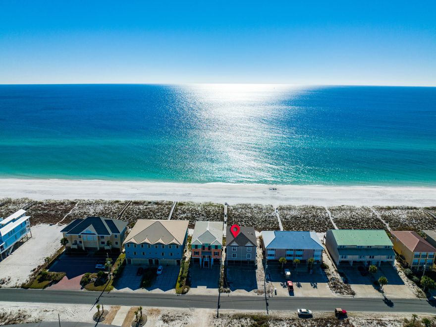 A truly stunning Gulf Front Townhome on Navarre Beach, with an elevator! The quintessential beach home, with tile floors throughout, sandy feet are no problem here. Featuring 3 bedrooms and 3 full bathrooms, a large kitchen, and living area, as well as multiple outdoor living areas, ideal for taking in the beautiful scenery and weather the Emerald Coast has to offer. Traverse over the white sandy dunes on the boardwalk down to the immaculate beach. On the third level, there is a North facing guest bedroom and full bathroom as well as the master suite, perfectly situated facing the Gulf of Mexico. In the master, you are blown away by the views and the well-appointed master bath. On the main level is where a majority of the relaxing and entertaining will likely take place. There you will find the living area, kitchen and dining area. Off of the living area, there is an expansive outdoor patio that gets ample amounts of sun throughout the day. Also on the main level is a guest bedroom a full bathroom and a laundry room. The only thing this home is missing is you!

Navarre Beach is one of the last places with the old Florida feel and is home to Florida's Longest Fishing Pier. Enjoy Crowd free beaches, Emerald green waters and miles of Sugar White Sandy Beaches, walking & biking trails, a fishing pier, Gulf Island National Seashore to the west, and county owned park to the east for ultimate in privacy and leisure.