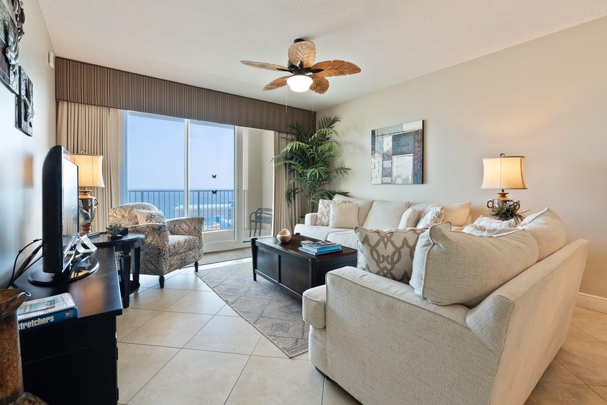 MOTIVATED SELLER!!!   Enjoy sweeping,breathtaking views of the white beaches,  gulf and coastline from this immaculate 18th floor unit with newer furnishings. The 6'x25'private balcony  can be accessed from the living room or master bedroom.  Beautiful granite enhances the gorgeous cabinetry which is fully furnished.  Breakfast bar adds additional seating. Tile flooring flows from the entrance thru the living room and LVP has replaced the carpeting in both bedrooms.  Garden tub with a separate shower in the master bathroom while a combination tub shower in the guest bathroom.  Laundry room is equipped with a new stackable washer and dryer,  Complex has two pools( one heated in winter months). A 9 hole golf course, fitness center, tennis courts2000' of deeded beach access. Concerts are held across the street throughout the year.  Make sure you add this to your list to view....you won't be disappointed.  