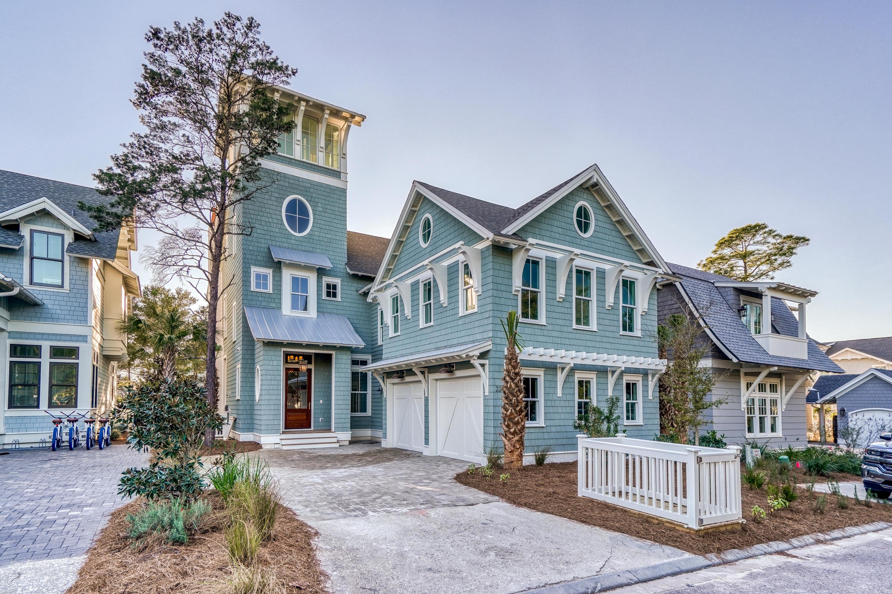 Discover a refined coastal ambiance throughout this new construction Watersound Beach home. Located in a coveted community location bordering Yacht Pond, no detail has been overlooked to create a truly stunning, one-of-a-kind property. The spacious outdoor retreat includes a private heated swimming pool & ample deck space for relaxing. Special features include Venetian plaster walls, custom millwork, handcrafted wood ceiling beams, an elevator & marble bathrooms. The spacious open concept living & dining areas are centered around a tabby shell fireplace, grounded by gorgeous white oak hardwood floors & filled with abundant natural light. Sliding bifold doors from the kitchen open to the screened porch allowing a fluid space for gathering.