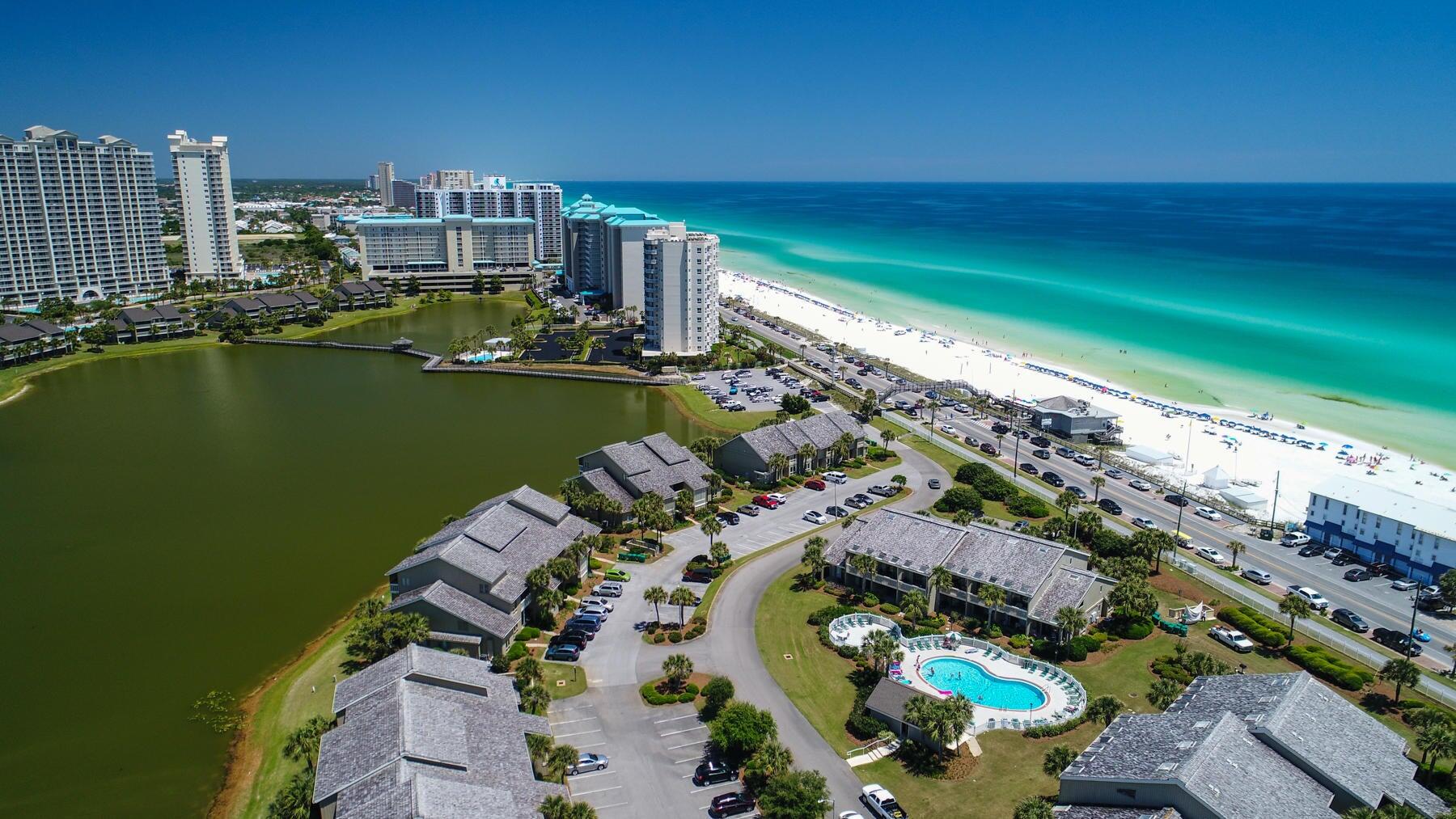 Lowest $ per square foot in the complex In the exclusive Seascape Resort of Miramar Beach!This stunning ground-floor unit offers not only a prime location, also incredible convenience for both vacationers and owners alike. Imagine being just 50 steps from the sugar-white sands and emerald waters of the Gulf of Mexico, where your beach day is always within reach.Plus, you're only 20 steps away from one of the resort's five luxurious pools, making it easy to cool off & relax.Seascape host multiple big name music headliners a year. A new Walk Ons- Louisiana style sports bar starting April.Projections 30-35k a year in rentals Appraisal already completed! Screened-in patio overlooking a tranquil lake where you can sip coffee in the morning or evening wine with a peaceful view This serene setting offers a quiet escape after a fun-filled day at the beach or exploring the vibrant local area.
Seascape Resort itself is a haven of amenities, offering tennis courts, a golf course, a fitness center, and access to beachside dining. Beyond that, the resort has some amazing concerts and events, hosting some of the biggest names in music, including Luke Combs, Lyle Lovett, Melissa Etheridge, Tanya Tucker, and many more, making it a destination for both entertainment and relaxation.
Location, location, location! Not only are you steps away from the beach, but you're also a short distance from some of the best restaurants and shopping on the Emerald Coast. The Surf Hut, known for its seafood and beachfront views, is just minutes away, as is Acme Oyster House and Whale's Tail Beach Bar & Grill for casual dining by the shore. For those seeking more upscale experiences, Oceans Club and Seagar's Prime Steaks & Seafood are a short drive away, offering the perfect blend of fine dining and beachside elegance.
Love to shop? You're a quick trip from Silver Sands Premium Outlets, one of the largest designer outlet malls in the nation, offering luxury brands like Michael Kors, Coach, and Nike. Also nearby is the upscale Grand Boulevard, featuring Tommy Bahama, Anthropologie, Lululemon, and more, along with gourmet restaurants such as Emeril's Coastal and Fleming's Prime Steakhouse.
This property also presents an exceptional investment opportunity. The seller has paid all assessments in full, and the building improvements are scheduled to be completed any day now, giving the buyer peace of mind.
Don't miss your chance to own a slice of paradise on the Emerald Coast!