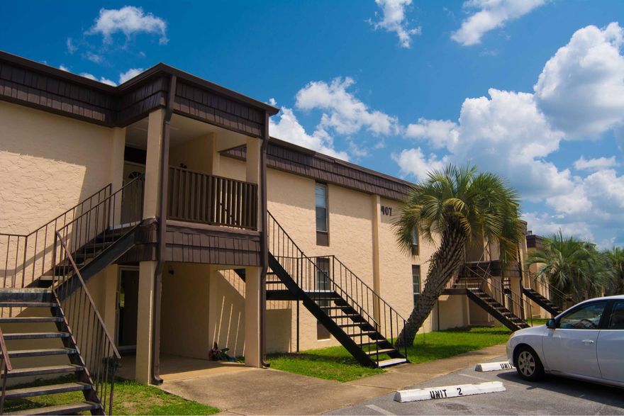 BEAUTIFULLY updated two bedroom, two full bathroom condo at Spanish Villas--so close to shops and restaurants (a sports bar basically in your backyard) and a very short drive to the beach. Spanish Villas is currently under new management with lots of uplifting plans in the works. The condo itself has been completely revamped: has a brand new A/C condenser; new water heater; new flooring and ceiling fans in bedrooms; new vanity tops, faucets, flooring, and lighting in both bathrooms; all new, neutral paint throughout; and a 100% new kitchen, including stainless steel Frigidaire appliances, cabinets, granite countertops, sink, faucet, disposal, lighting, floors, and reconfiguration to provide more counter space. Call your Realtor to come take a peek TODAY! Buyer to verify all important info.