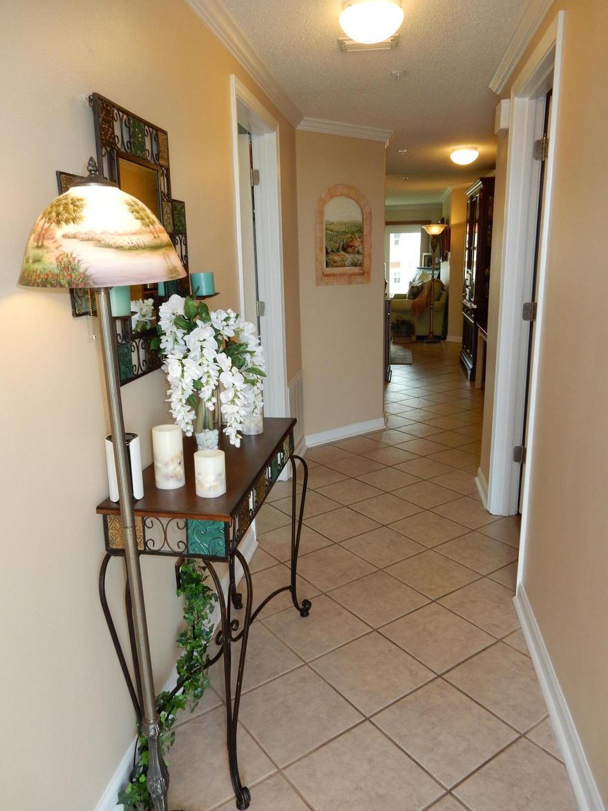 COASTAL LIVING ON OUR SCENIC BEACH ROAD AT ITS BEST! THIS 3RD FLOOR UNIT HAS UPDATED KITCHEN, BATHS, FLOORS, LAUNDRY ROOM, AND HURRICANE RATED SLIDERS TO THE BALCONY AND WINDOWS!This home has been a primary residence and has been treated with love and respect. The immaculate and beautifully detailed condo is waiting to become someones private residence, 2nd home or vacation rental which is a must see for the discerning buyer.