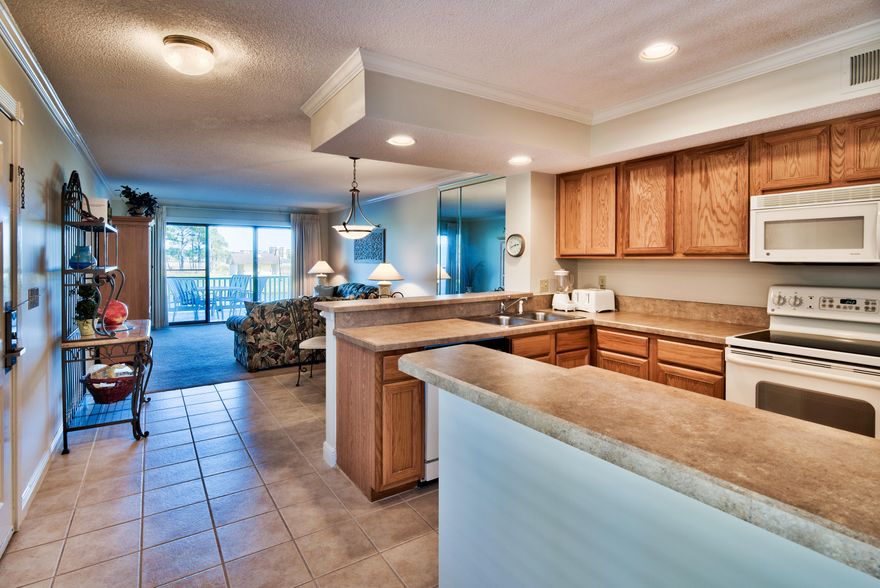 You can't beat these bay views! Sit on the deck and enjoy the expansive scenery across the green grass of the Links Golf Course to the sparkling water of Horseshoe Bayou & the boats docked at the Baytowne Marina. This charming resort home is available just in time for you and your family to enjoy the summer at the beach. Property is freshly painted and is conveyed fully furnished, including televisions, artwork and housewaresjust turn the key and enjoy all that Harbour Point and Sandestin Golf and Beach resort have to offer. Come enjoy all of Sandestin's 2400 acres of fun! Beautiful white sand beaches, four championship golf courses, a world class tennis facility with 15 courts, a 98 slip marina and all of the retail, restaurants and activities in the pedestrian Village of Baytowne Wh