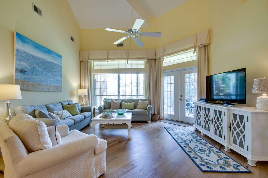 Large condo that feels like home! 3 full bedrooms and 3 full baths expand the main living area while spiral stairs lead to the 4th loft bedroom and full bath. The interior is immaculately cared for with new coastal furnishings, updated guest baths with quartz counters, all new master bath en-suite and hardwood flooring throughout the main living area & kitchen. New HVAC in 2019 and new appliances in 2012. The floorplan is bright and airy with high ceilings, open kitchen to living area, ample windows, and multiple balcony access doors. Relax all day on the screened balcony overlooking the 13th fairway of the Baytowne golf course. The screens were all replaced in 2016. New roof & exterior painting in 2018. Located just a few steps from the Tivoli community pool and beach access! As an introduction to the Sandestin lifestyle, we invite our new owners to explore amenities that make Sandestin special. The listing brokerage and seller(s) are presenting the buyer(s) of this property with (2) 90-minute rounds of Tennis court time, a golf foursome at one of our three championship courses, and a round of golf for up to four (4) players at the unrivaled Burnt Pine Golf Club.

Sandestin Golf and Beach Resort is a major destination for all seasons and all ages, and has been named the #1 resort on Florida's Emerald Coast. This magical resort spanning over 2,000 acres is comprised of over 70 unique neighborhoods of condominiums, villas, town homes, and estates. The resort features miles of sandy white beaches and pristine bay front, four championship golf courses, a world-class tennis center with 15 courts, 4 resort swimming pools (and 15 private neighborhood pools), a 123-slip marina, a fully equipped and professionally staffed fitness center and spa, meeting spaces and The Village of Baytowne Wharf, a charming pedestrian village with events, shopping, dining, family entertainment and nightlife. For true golf cart community living, Grand Boulevard is just outside the resort gates and provides access to additional shopping, dining and entertainment  all without traveling on Hwy. 98.  Come to Play, Stay for Life!