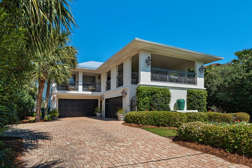 Experience harbor front living in Destin at its finest. This Harbor front home has a total of 5,284 sq. ft. under roof with 2,594 sq ft. heated /cooled space. Perfect for a personal residence, second home to a vacation/rental. This beach style home boasts four boat slips including a large slip that can accommodate a 70'ft ++ boat. There is a covered lift for up to a 30'ft boat. This home is every water sports lovers dream! ''The Guest enter the home at the second floor front veranda featuring tasteful outdoor furnishings, and travertine tile. Once you enter the home from the second floor veranda you will see a very open living room, dining room and kitchen area that is very cozy for entertaining family and friends. Enjoy beautiful sunsets on the large deck just off the second level Located on Holiday Isle , the home is just minutes away from the sandy white beaches , the Destin airport, shopping, restaurants, and all that the Destin lifestyle has to offer .