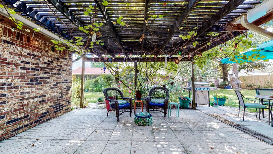 This terrific brick ranch style home in Niceville offers so much! Two en suite masters, two additional bedrooms and another bath to meet your needs for family or visitors. A living room with fireplace, a dining room and a family room provide options for meals, gatherings or just some privacy. A beautiful grape arbor covered patio for relaxing and entertaining reminiscent of a Tuscan villa is the gateway to the backyard. A 6'x8' greenhouse to test out your gardening skills and a 16'x10' yard building with electrical for storage or perhaps a workshop round out the fenced back yard. There are driveways on each side of the house for ample parking. One is very deep and has a 10' high, 12' wide, 20' deep covered carport with 30 amp electrical service suitable for an RV, travel trailer or a boat. At the end of a cul-du-sac, no worries about traffic or kids playing.Must see to appreciate!