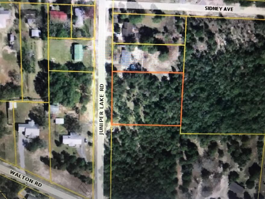 Great 1.2 acre lot in Defuniak Springs close to Juniper Lake .