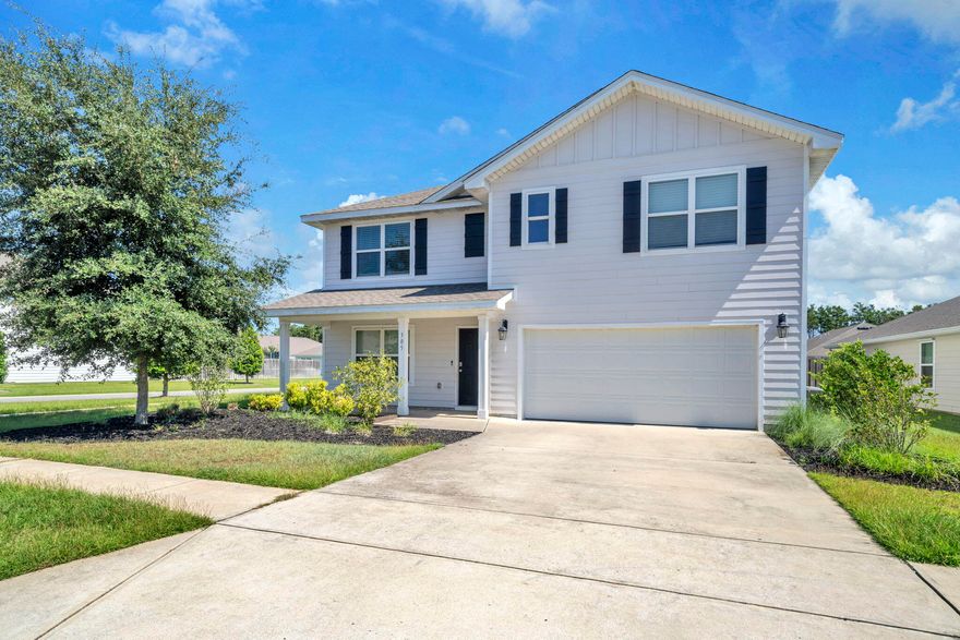 If you've been searching for that perfect home in Hammock Bay and waiting for one at a price that just instantly makes sense, you've found it. 305 This Way is priced aggressively for a quick sale all while offering over 2500 square feet, 5 bedrooms, 3 baths and on a large corner lot. Once inside, you'll find an open floorplan that flows effortlessly. Immediately upon entering you'll find 1 of 2 additional family rooms. The open living, kitchen and dining areas offer plenty of space to relax or entertain. Upstairs you'll find 4 of the bedrooms plus the 2nd family room, perfect for a kids' play area, office or additional living space. And the master bedroom - generously oversized at 13X20 feet with an equally impressive master bath and walk-in closet. And the oversized proportions extend outside into the large backyard which is a blank canvas waiting for your personal touch - gardens, pool, outdoor kitchen - endless possibilities. Hammock Bay is a lifestyle community with amenities for everyone. Amenities such as the Freeport Regional Sports Complex, bayfront pier & boat dock, multiple community pools, impressive fitness center, tennis, and onsite food and entertainment options.  Hammock Bay is located in the heart of Freeport and is conveniently located within 30 minutes of South Walton's sugar white beaches. Come see this one for yourself before it's gone.