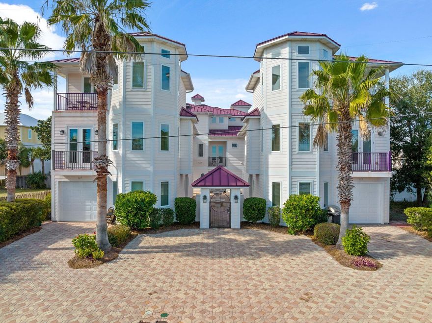 Ideally situated on the west end of Panama City Beach, just a short walk to the white sands and emerald waters of Laguna Beach, this elegant 3-story residence offers 5 bedrooms, 4 full bathrooms, and an exceptional blend of coastal charm and modern sophistication.A compelling opportunity in today's market--priced with intention to sell. Whether as a primary residence, vacation retreat, or income-producing investment property, this home offers outstanding value for buyers seeking a move-in-ready option in one of the area's most desirable beachside communities.Thoughtfully designed for comfort and convenience, recent updates include the conversion of a bonus area into a fifth bedroom, bamboo and tile flooring. A private elevator services all three levels enhancing accessibility and ease of living.

The first level features a second master suite, two additional bedrooms, and a shared bathideal for hosting family or guests.

On the second level, an open-concept living and dining area is filled with natural light and opens to two balconiesone overlooking a charming brick-paved courtyard, the other with partial lake and Gulf views. The chef's kitchen is equipped with granite countertops, solid wood cabinetry, pantry, and stainless steel appliances. An electric fireplace and custom TV niche complete the space, while a well-appointed laundry room offers extra storage and a utility sink.

Occupying the entire third floor, the expansive primary suite is a true retreat, featuring a generous walk-in closet, a spa-like bath with whirlpool tub and dual-head shower, and a private balcony.

Located just minutes from Pier Park, and fine dining, this is a rare opportunity to own a premier coastal property in one of Laguna Beach's most sought-after enclaves.