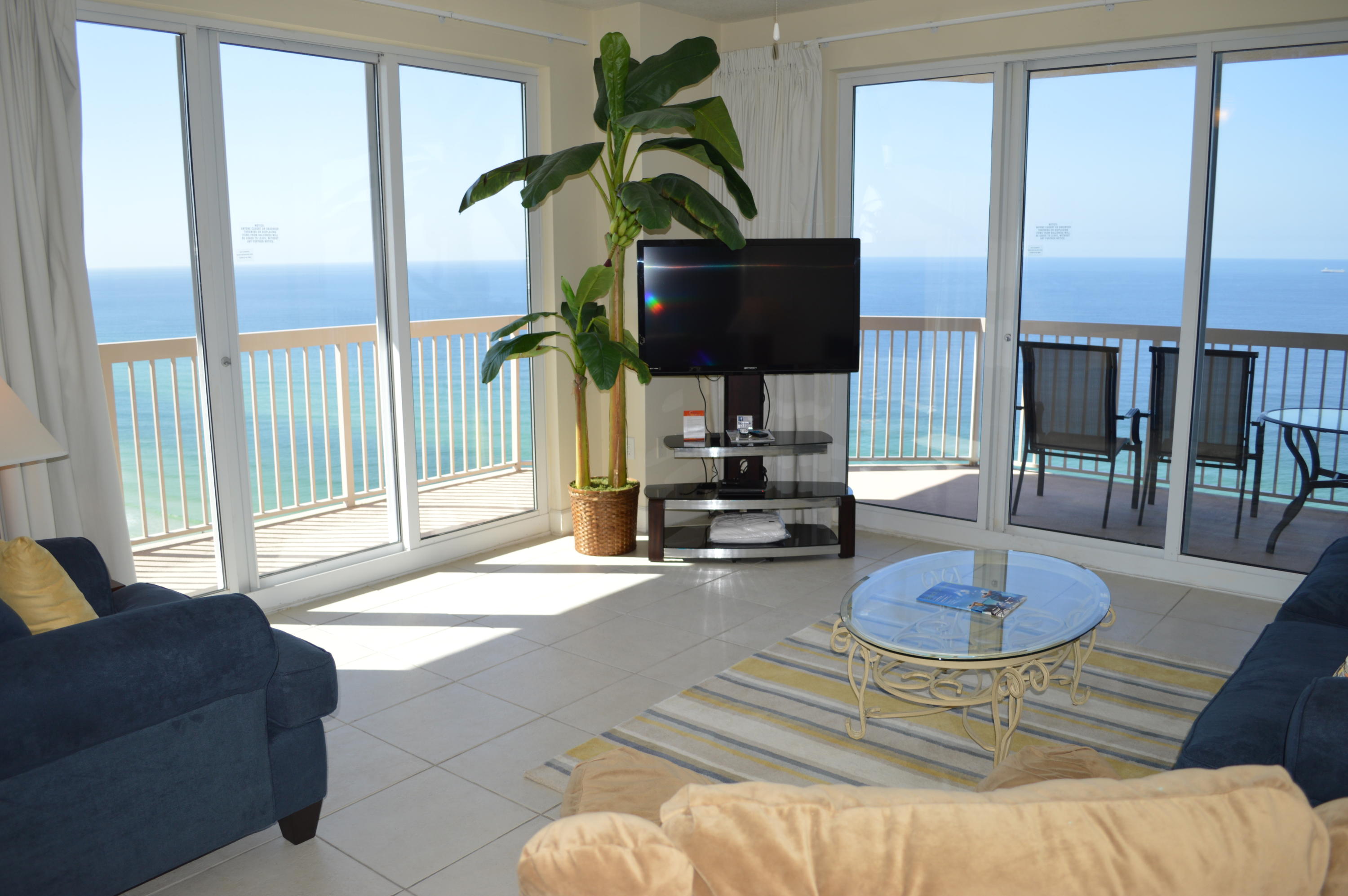 BEST PRICED 3BR UNIT AT SUNRISE BEACH! This incredible Gulf front east end corner unit has a large wraparound balcony with breathtaking views of the Gulf of Mexico and beautiful white sandy beaches. This unit has a spacious and open floor plan, high ceilings, and tile floors throughout the entire unit. Large glass windows and doors span across the living area to maximize the views. The kitchen is upgraded with granite countertops and breakfast bar. The master bedroom has direct balcony access and a large garden tub in the master bath to unwind in after a long day on the beach. There is a washer & dryer in the unit and it is being sold fully furnished with modern beach decor. There is plenty of storage for Unit 2401 with two walk-in closets in the unit, as well as an additional storage