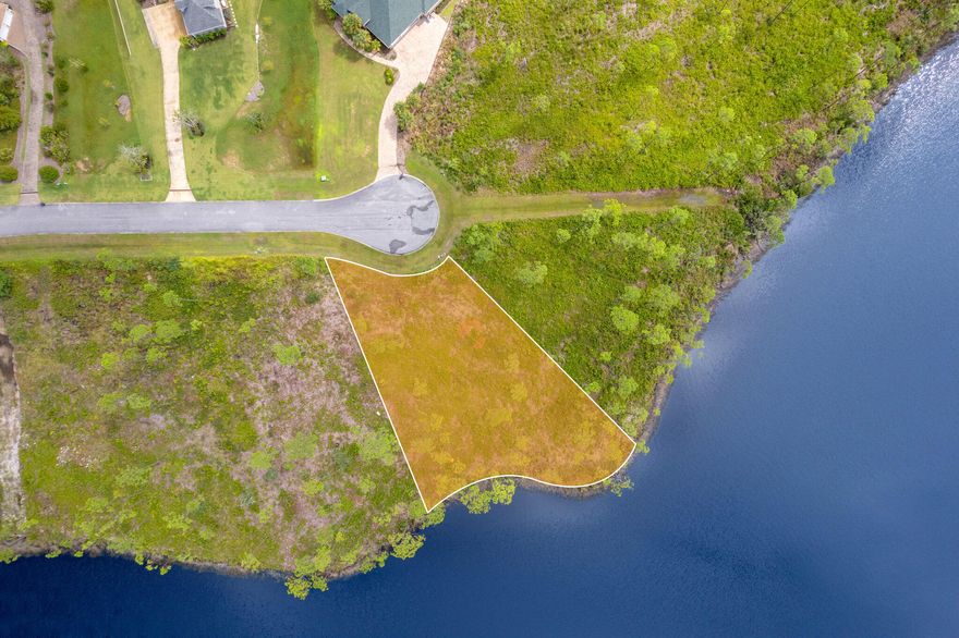 Beautiful waterfront building lot on 1/2 acre in the gorgeous Laird Bayou subdivision.  With 174' of water frontage, this property is a fisherman's paradise with easy access to the Gulf of Mexico.  Enjoy stunning sunsets while watching the dolphins from your yard.  Lot is in desirable Flood Zone x so flood insurance is not required.  Amenities include a community pool, bath house, boat ramp, and boat/rv storage lot.  Laird Bayou is an exquisite community  that is a short drive to shopping, schools, and Tyndall AFB.  If measurements deemed important, please verify.