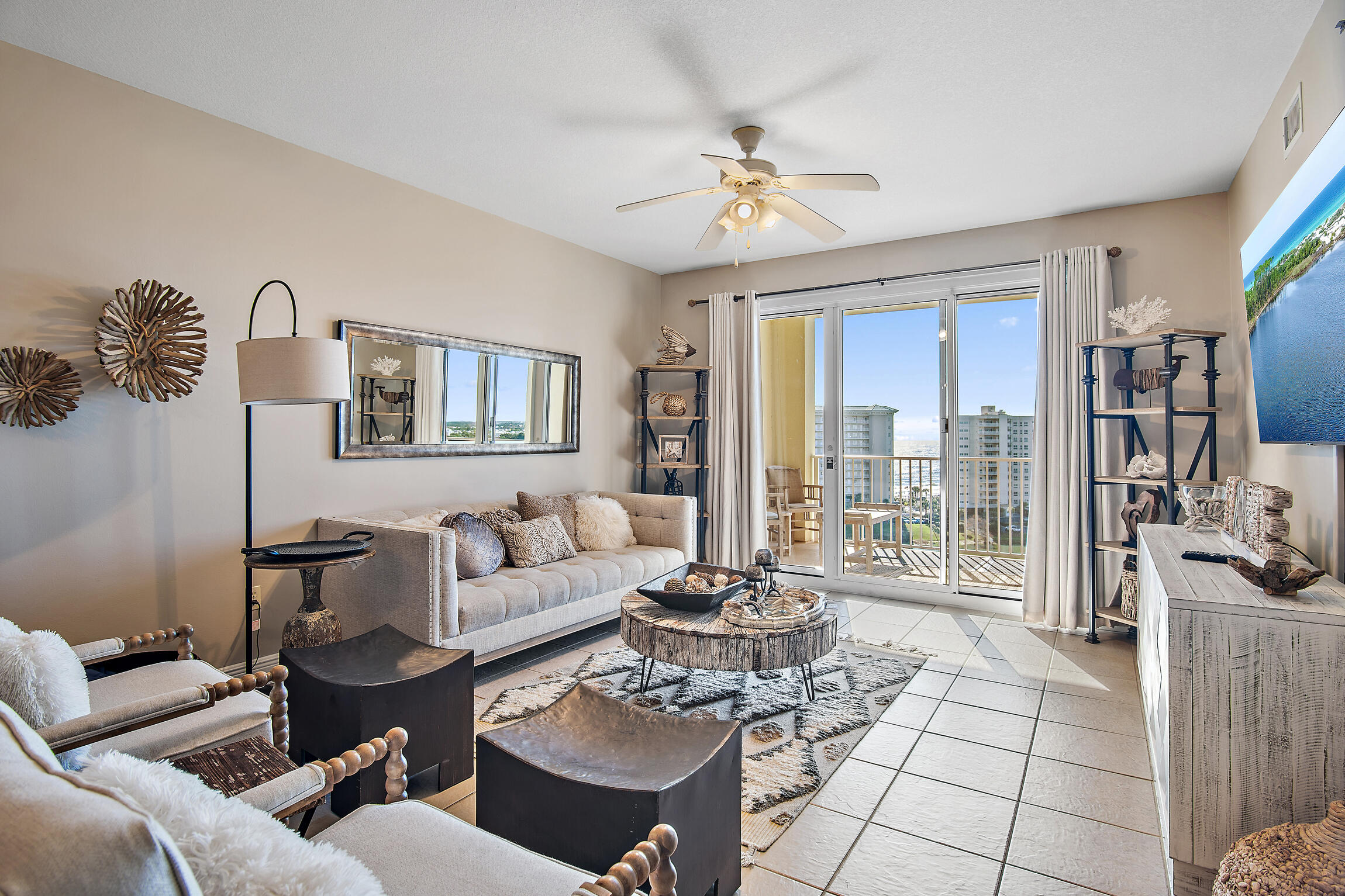 Come enjoy this elegantly appointed two bedroom plus bunkroom gulf view Condominium in the highly desirable community of Ariel Dunes ll. The panoramic views from this 10th floor residence are unequalled. Stunning views of the Gulf of America, Sugar white sand beach, Tennis courts, 11,000 square feet of swimming pools and the Coastal dune lake all help bring relaxation to another level. While there are plenty of options to enjoy in the area you may want to relax on the fully furnished gulf view balcony or step inside and fall into the plush neutral tone couch and let the sights and sounds of the world drift away while you take in the upscale beach inspired interior decorator touches carefully selected to make this your home away from home. When you get fully rested and ready to test your adventurous side in the kitchen, you'll enjoy a fully equipped chefs kitchen with stainless steel appliances and black granite countertops. Your guests can enjoy your culinary creations at the hardwood table or the counter top bar area; There isn't a bad seat in the house! When the day is done, or its time for a good book and some alone time, slip away into the private oasis of the master bedroom with a hand carved four post king size bed and master bath with oversized soaking tub and separate shower. Don't feel like cooking? that is always an option and with restaurants and shopping minutes away you have multiple choices of beachside dining, fine dining, outlet mall shopping or upscale boutique hopping. The choices and possibilities are endless. With this fully furnished and rental ready Condominium there's always plenty of room for you and your guests. with the second bedroom that has a queen size bed and the bunk room as an added bonus for kids or young adults. All Kitchen Appliances and Hot water heater were replaced in 2022. You've found your paradise; come visit, picture your family and friends making memories that will last a lifetime and finally make it your home or home away from home!