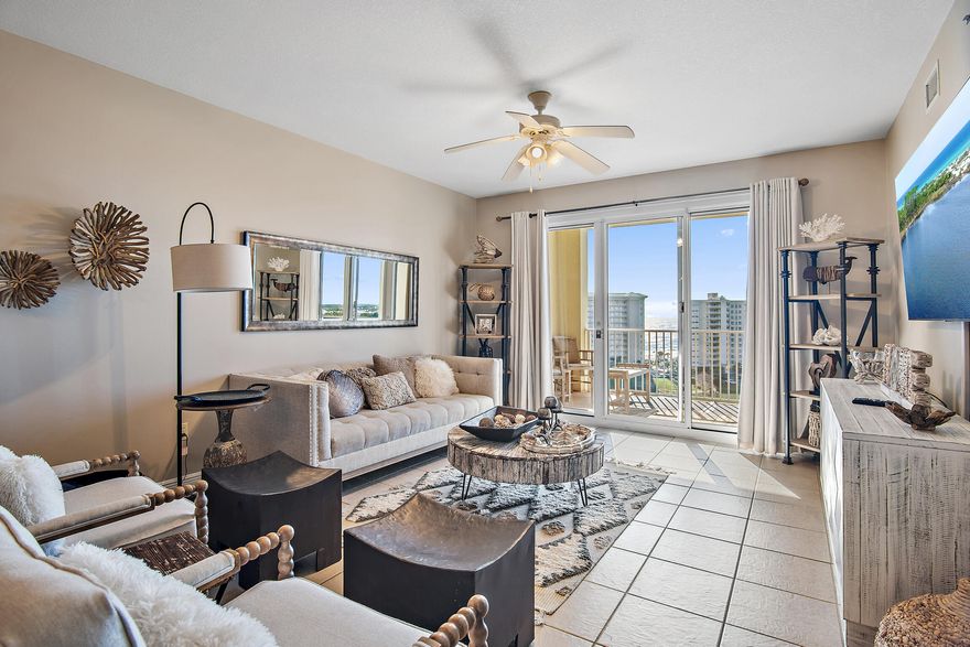 Come enjoy this elegantly appointed two bedroom plus bunkroom gulf view Condominium in the highly desirable community of Ariel Dunes ll.  The panoramic views from this 10th floor residence are unequalled. Stunning views of the Gulf of America, Sugar white sand beach, Tennis courts, 11,000 square feet of swimming pools and the Coastal dune lake all help bring relaxation to another level.  While there are plenty of options to enjoy in the area you may want to relax on the fully furnished gulf view balcony or step inside and fall into the plush neutral tone couch and let the sights and sounds of the world drift away while you take in the upscale beach inspired interior decorator touches carefully selected to make this your home away from home.  When you get fully rested and ready to test your adventurous side in the kitchen, you'll enjoy a fully equipped chefs kitchen with stainless steel appliances and black granite countertops.  Your guests can enjoy your culinary creations at the hardwood table or the counter top bar area; There isn't a bad seat in the house!   When the day is done, or its time for a good book and some alone time, slip away into the private oasis of the master bedroom with a hand carved four post king size bed and master bath with oversized soaking tub and separate shower.  Don't feel like cooking? that is always an option and with restaurants and shopping minutes away you have multiple choices of beachside dining, fine dining, outlet mall shopping or upscale boutique hopping.  The choices and possibilities are endless.  With this fully furnished and rental ready Condominium there's always plenty of room for you and your guests. with the second bedroom that has a queen size bed and the bunk room as an added bonus for kids or young adults.  Kitchen Appliances and Hot water heater were replaced in 2022 with Washer and dryer replaced Sept 2025.  You've found your paradise; come visit, picture your family and friends making memories that will last a lifetime and finally make it your home or home away from home!    