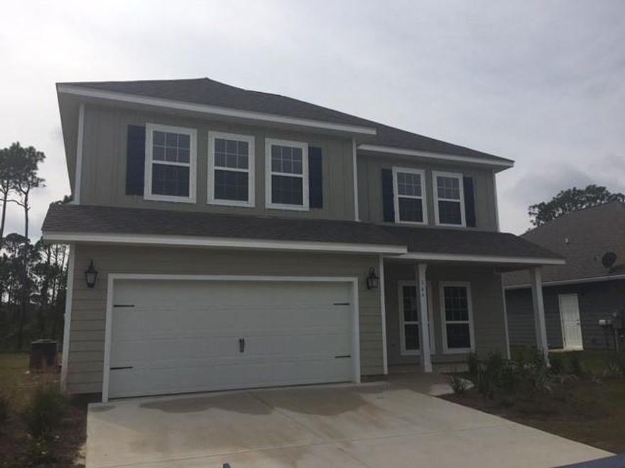 Welcome to Eagle Bay Landing! This beautiful beach home is a rarity with large back yard backing up to wooded privacy! Featuring two stories with the highly sought after master bedroom on main level, 3 1/2 baths and a bonus room you wont want to miss! Nice size covered back patio great for grilling and two car garage. This home is located on a large lot with tons of side yard and very private back yard. Home has beautiful granite counters, crown molding, hand painted cabinets, tile shower, hardwood and tile flooring. A must see in the newly released community of Eagle Bay Landing. This pool community is just the perfect location minutes from the Gulf and Bay. Sacred Heart Hospital, Grand Boulevard and Florida state parks are all within minutes! Ask about our incentives!