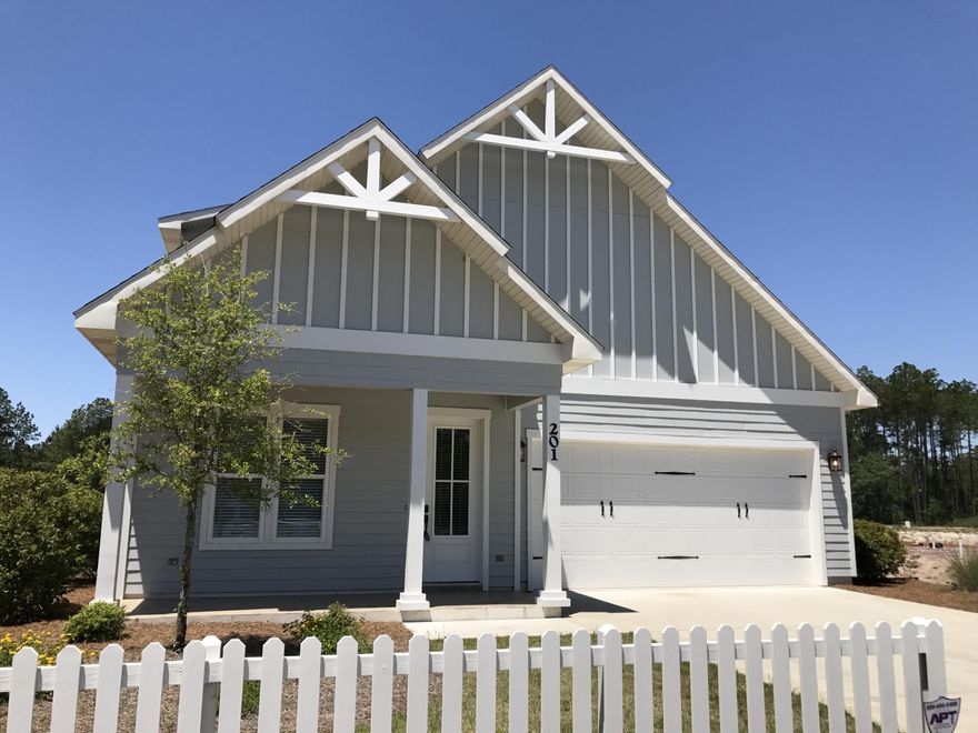 SumBoswell Builders Model Home Open Daily. South Walton's Best kept secret, Paradise Cove a coastal cottage living community, located only minutes from the white sands beaches of Seaside, Seagrove and Grayton Beach. This Three bedroom, two and a half bath plan is completed and offers an open concept plan, large kitchen with plenty of counter space, custom cabinetry with soft-close, stainless appliances,and granite countertops. 10' ceilings with crown molding. The Dining room opens to the covered patio. The large master bedroom is a perfect retreat after a long day. The master bath offers a garden tub, dual sinks, and frameless walk-in shower. This home does not lack closet space!! The attention to detail, and care into each home can be seen in the craftsmanship in every home.