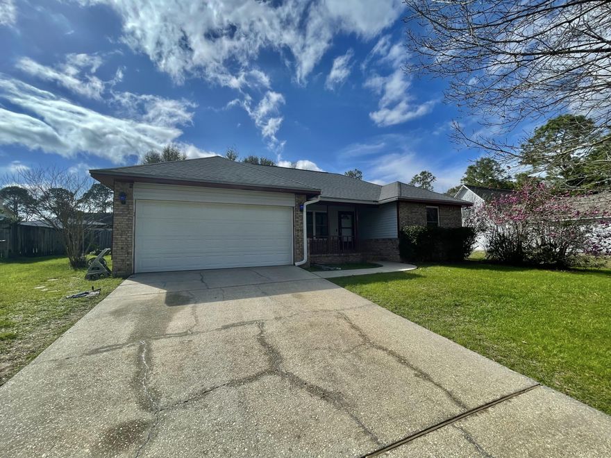 Welcome home! This adorable SOUTH Crestview home is positioned for convenient access to all area bases, and just 40 minutes from the beautiful beaches of the Emerald Coast. Pride of ownership abounds in this well maintained 1200 SF, 3 bedroom home. All major systems have been updated and the kitchen was fully updated in 2018 - beautiful granite countertops and stainless steel appliances with full cabinet replacement. Living room features vaulted ceilings and gas fireplace with floor to ceiling brick. NO carpet! Both master bathroom and guest bathroom have been updated within the past 5 years. Large, nearly 1/3 acre lot with fully fenced backyard and HOT TUB! Put this one on your list- so cute and ready for new owners!