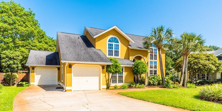 This beautiful 4 bedroom, 3.5 baths home is located in one of the best family neighborhoods in Gulf Breeze with easy access to the Tiger Point golf course and clubhouse. This home features gorgeous finishes, granite and travertine in the kitchen and baths, a 5 burner gas cook top with commercial hood vent, a wine cooler built into the island, hardwood floors throughout the living areas, and brand new carpet in all the bedrooms. This home is backed up to a private beautiful pond with both enclosed and open outdoor living areas! The backyard features abundant landscaping, stone pavers, and an open deck with stairs down to the water. Backyard can accommodate a gunite pool. Tiger Point is minutes away from all the essential shopping with Walmart, Lowes, Starbucks, Publix(coming soon).