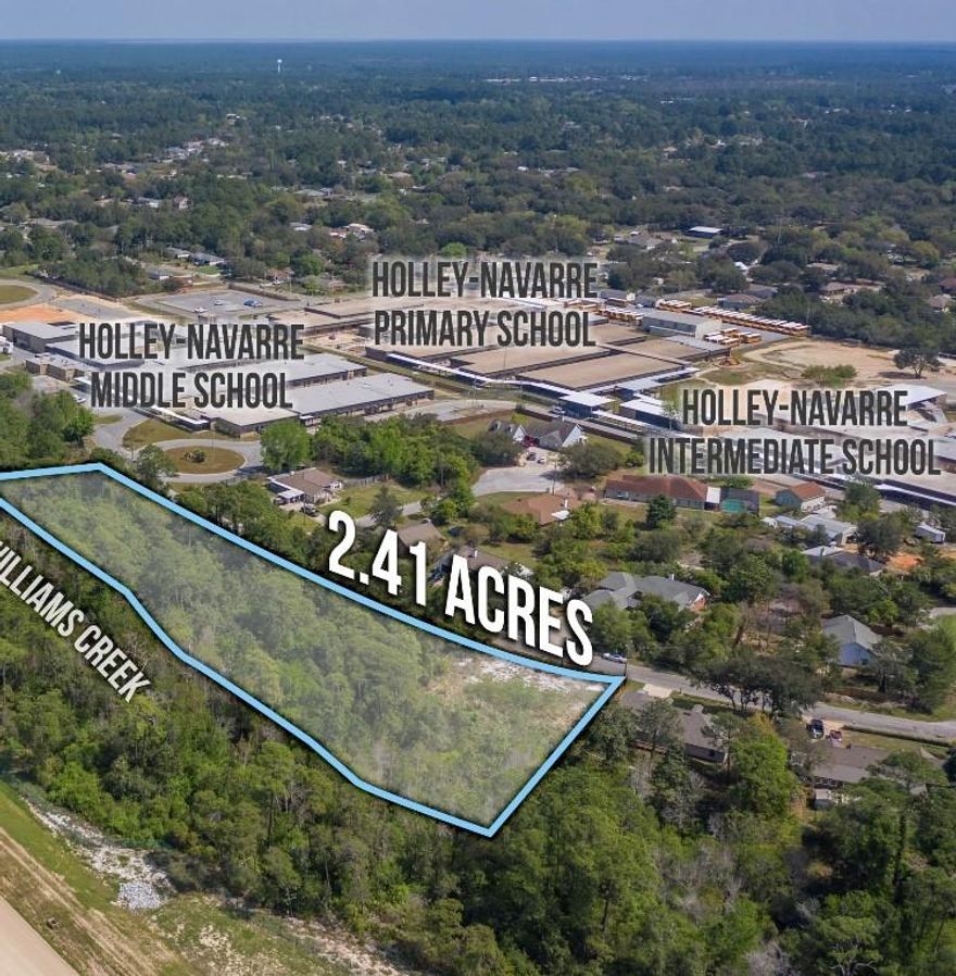 Build your dream home on beautiful land located on a cul de sac that ends at the school! These 5 lots are preparceledand are being sold as one! Sought after area in Navarre convenient to schools, shopping, restaurants, and beaches. Electricity and Public Water are available on the property. Land backs up toWilliams Creek where you can enjoy fishing or even kayaking/paddle board to the sound! So many opportunities to build your own home, invest in land, or build multiple homes.  Seller is motivated!