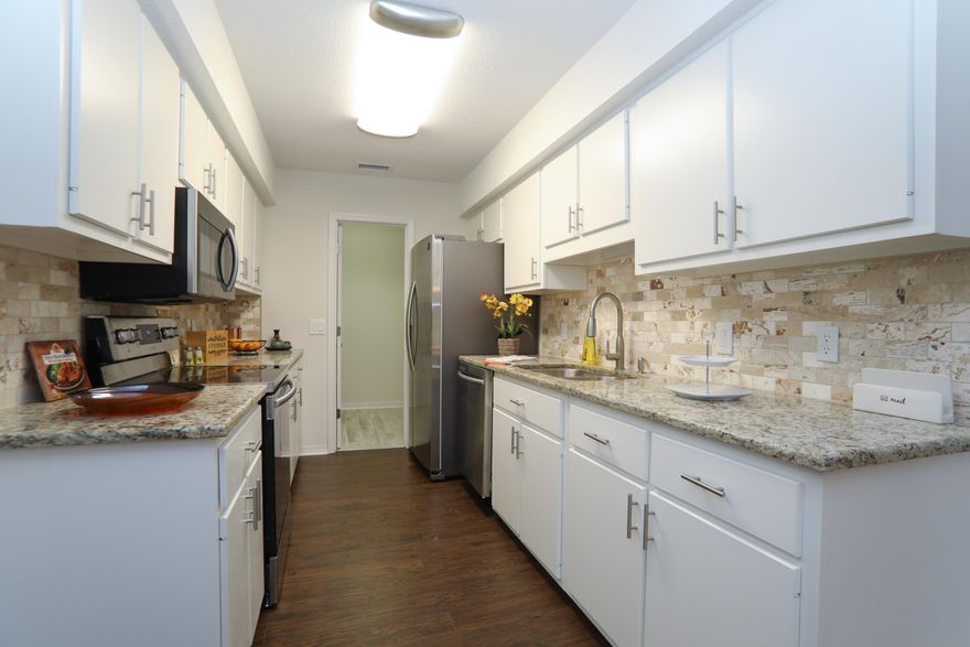 Must See *360 Spherical Virtual Tour in photos tab* Completely updated home in the heart of Crestview. Upgrades include- fully updated kitchen with Granite back splash and stainless appliances, new interior paint, new luxury vinyl hardwood flooring in living areas and carpet in bedrooms,new fans and lighting throughout, fully updated bathrooms and more!. Two car garage with additional space for storage.