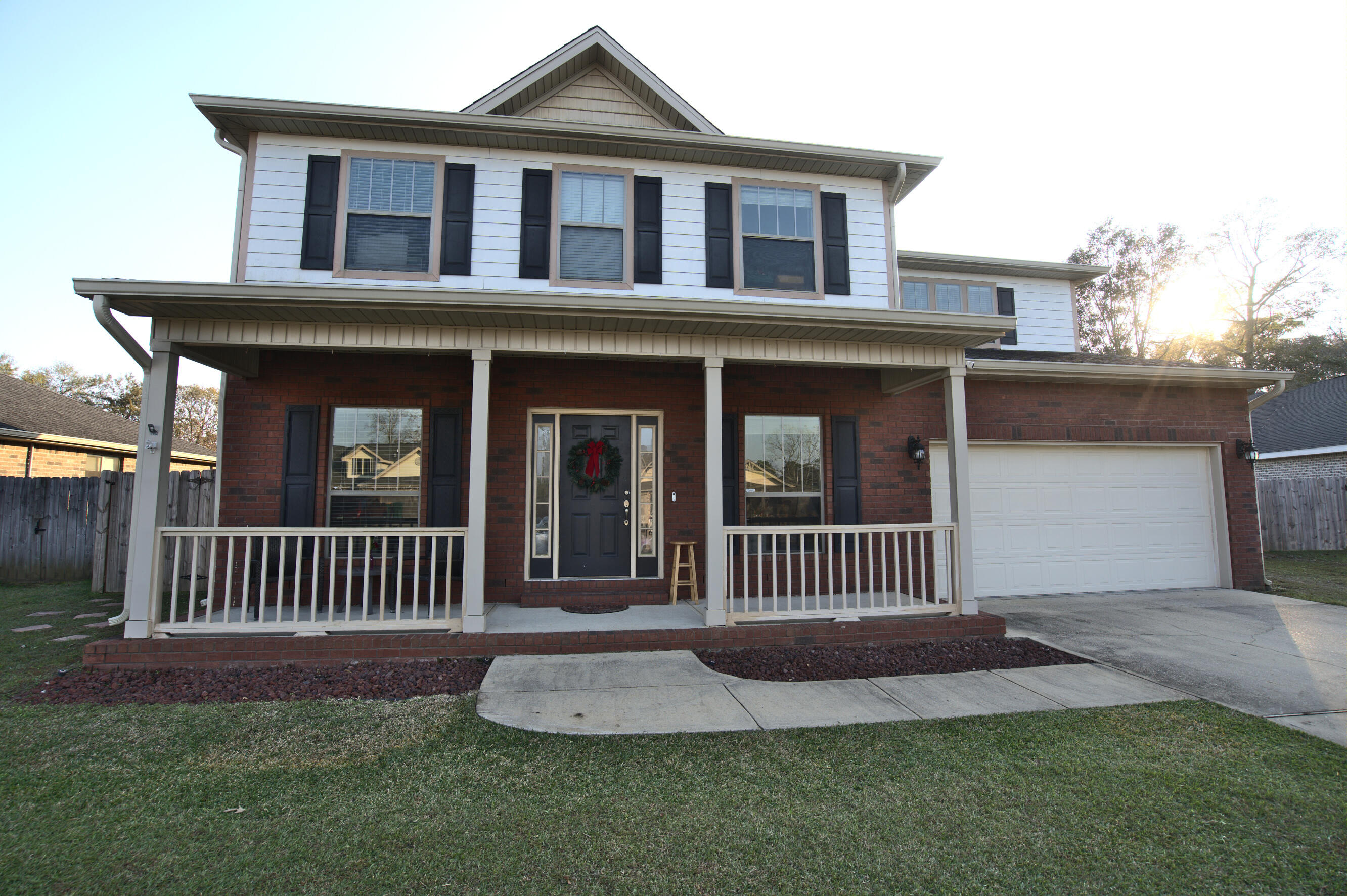 This spacious two-story home offers comfort, convenience, and a host of amenities:  Perfect for families or those who love extra room. Fenced Backyard with 2 gated entries makes it ideal for privacy and outdoor activities. Enjoy a luxurious large shower in the Master Bath. Another bedroom with its own bath is located downstairs. New flooring in main areas. Laundry area is conveniently located upstairs. The Kitchen is equipped with stainless steel appliances to include double ovens. Walking distance to pool & tennis courts. Situated in North Crestview: within a mile to Publix, the library, post office Middle & High schools. Approx 6 mi to I-10. Pets welcome with owner's approval. Available now!  Schedule your viewing today!