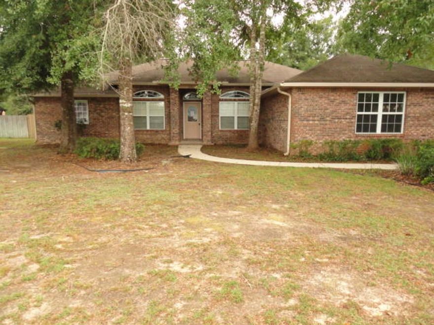 ''REO'' This partially renovated home in Baker is just waiting for you to call it home. Fresh paint, new carpet, and new appliances make this home even better. The living room is large and has tile floors. The breakfast room and kitchen have vinyl floors. The formal dining room is situated for privacy. The master suite is spacious and features 2 walk in closets. Master bathroom features His/her vanities, separate toilet room, garden tub and separate shower. The kitchen has a new dishwasher, smooth top range and microwave. Off the living room is the Florida room leading to the rear privacy fenced yard. The property has mature oaks for shade, and azaleas for flowers. Schedule your appointment today!See attachment for PAS requirements and WFHM offer submittal information in MLS documents