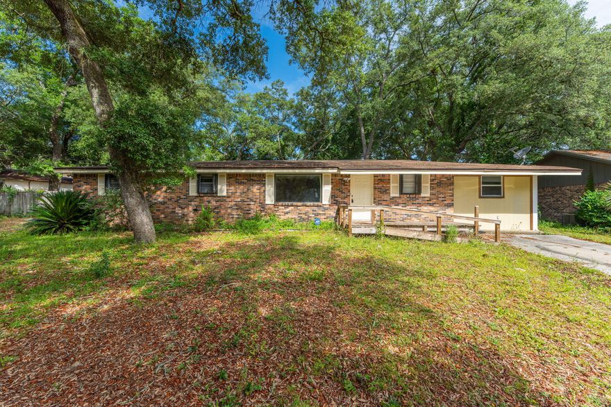 Investment opportunity NOW AVAILABLE or great lots for building your dream home across from the water! BOTH lots being sold together and views of the bayou from the front yard make this a fabulous location! Public boat launch is directly across the street! Original built 1967 ranch style home is ready to remodel and make it a cute home on a large lot OR remove the home and make your dream a reality! Property is being sold WITH parcel next door. BOTH properties will be sold together at closing and BOTH properties should be included on an offer document (Parcel 09-1S-22-2140-000E-0110 AND Parcel 09-1S-22-2140-000E-0100).