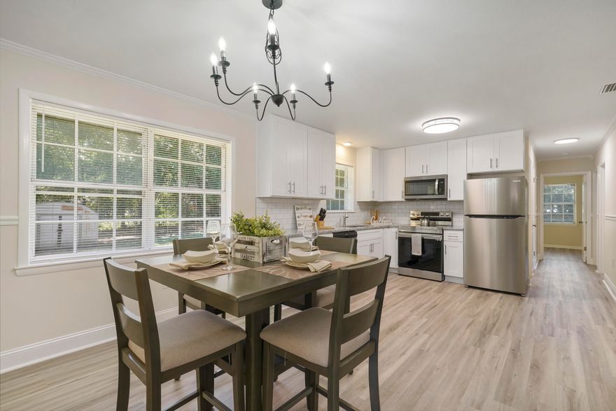 BEAUTIFULLY RENOVATED!! This adorable, fully updated and affordable 3BR/1.5 BA home is move-in ready and conveniently located in Crestview <2 miles from all 3 schools! From top to bottom, you will find a long list of updates and custom features that will appeal to all Buyers. You'll have peace of mind with the NEW ROOF, NEW WATER HEATER, and NEW HVAC ductwork. You will enjoy the flow of this home, which features all new paint,  flooring, and lots of natural light. The fully updated kitchen boasts 42'' Shaker-style cabinets with European hinges and soft closed drawers, elegant granite countertops, subway tile backsplash, and all new stainless appliances.Both bathrooms have been upgraded with modern vanities & mirrors, updated LED lighting, and new plumbing fixtures.