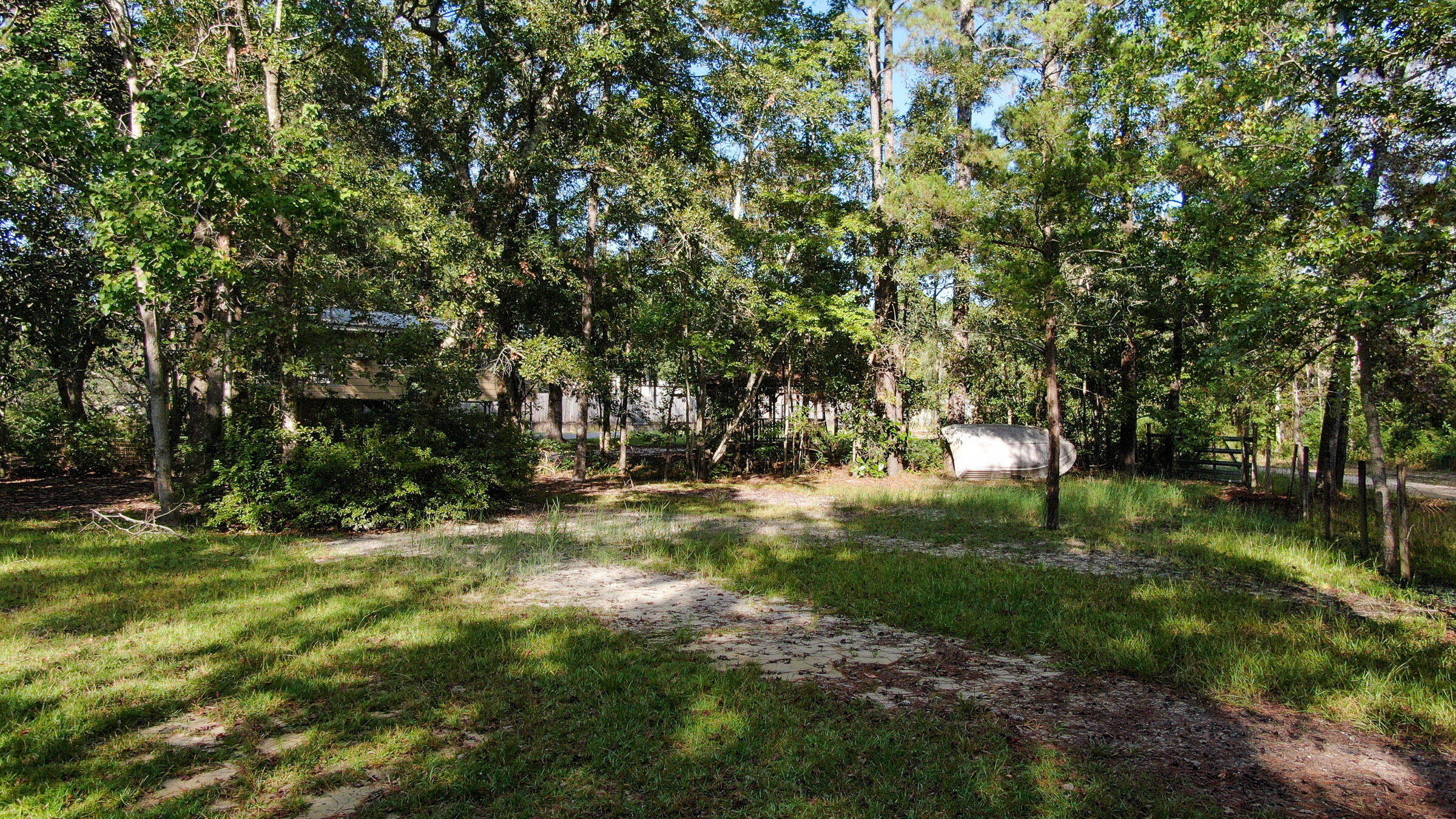 BUY A BEAUTIFUL DEEP WATER LOT ON ALAQUA CREEK AND GET A CABIN sitting on a gorgeous lot on a quiet dead end road situated on deep water Alaqua Creek with access to Choctawhatchee Bay and more. Catch fish from your own private dock or jump in your boat and head out into Choctawhatchee Bay which you can access the inter coastal waterway or the Gulf of Mexico. Cabin can be remodeled or torn down to make room for your new waterfront home in the heart of Freeport.