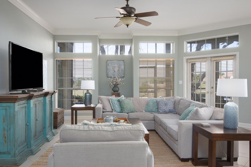 Lovely views of the 13th green at Baytowne Golf Course!  Sunny, fresh, and spacious! Impressive rental potential - $56,000 in 2019.  Large first level condo privately located on Tivoli Way just a few yards from the Tivoli swimming pool, and a short walk to the beach. This 3BR-3BA condo has tile floors, expansive windows, and an open floor plan with 10' ceilings. Updated kitchen with granite countertops and stainless appliances. New windows have been installed throughout. The screened porch provides an additional 260 sf of living space. There are large storage closets inside and outside.  This property is managed by Beach Blue Properties and is on a vacation rental program - rental information is available. *The unit is being sold furnished