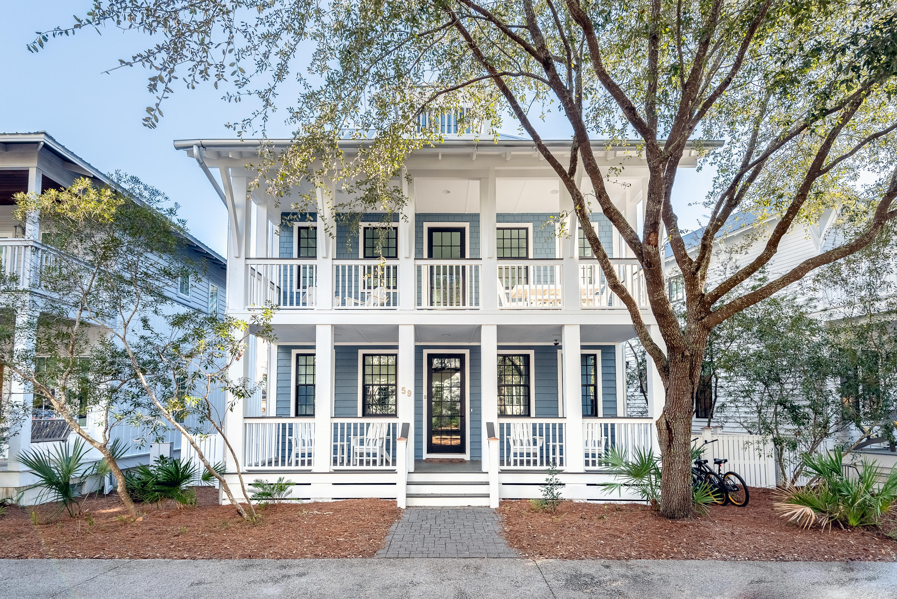 Serene and sophisticated, this impeccable 4BR/4.5BA Rosemary Beach retreat with carriage home is in a premium location overlooking the Cabana pool and park, steps from the Town Center, and a short walk to the beach. Freshly refurbished and newly furnished throughout, the design of this home invites gathering and relaxation with three levels of beautifully designed spaces. The reverse floor plan features a second level living and dining area highlighted by lovely community views with two separate living areas, a dedicated dining room, and a gorgeous kitchen complete with a large center island, marble counters, ample white cabinetry, and stainless-steel appliances. An additional living room along with a master suite and queen suite are located on the first level with private bathrooms and oversized closets. Two levels of covered porches are the perfect place to rest after a fun day in the sun. On the third level, discover an expansive bunk room with four built-in bunks, a private bathroom, and an open-air balcony. A breezeway connects the detached carriage home to the main home, situated over a spacious two-car garage. The carriage home offers defined living and dining spaces, a full kitchen, a bedroom, and a full bathroom.

Rosemary Beach is a welcoming beach town located along Scenic Highway 30A designed to reunite the concepts of community and connectivity in a quaint town setting. With its brick-lined streets, outstanding on-site amenities and charming town center with varied shops and locally owned cafes, locals and guests alike delight in this picturesque community.