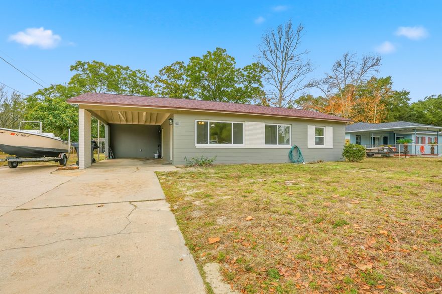 Discover modern coastal living in this stunningly renovated, move-in-ready home featuring a brand-new roof (2024) and a complete electrical overhaul with copper wiring. The chef-inspired kitchen boasts granite countertops , new shaker cabinets , a gas stove , and stainless steel finishes. Enjoy a seamless flow of LVP flooring throughout , freshly painted interiors and exteriors , and a climate-controlled Florida room with a new mini-split system. Complete with updated windows , a fully refreshed bathroom , and indoor laundry with a washer/dryer included, this home offers unmatched quality and style in the heart of Fort Walton Beach.