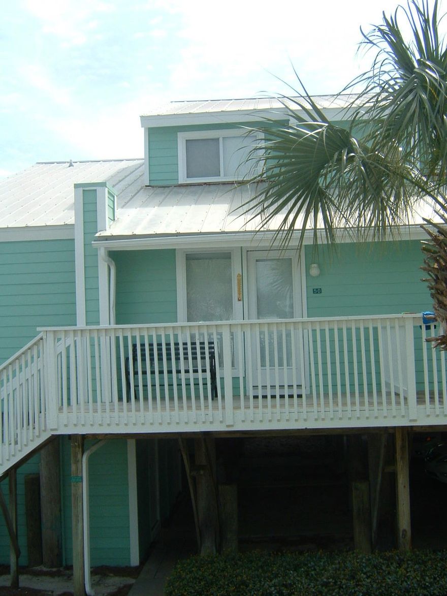One of only 2 bldgs. out of 11 that are elevated on pilings - park underneath & this unit has 2 storage closets in carport area * * POOL VIEW * Recently added upstairs 2nd bath with full size side by side washer/dryer, plus walk-in shower. Has twin beds in bunkroom off the living room, totally furnished * Has been second home for about 7 years * A/C system moved/replaced recently and kitchen appliances * AS IS WITH RIGHT TO INSPECT, owner is not aware of any problems * HOA most reasonable along the beach that includes EXTERIOR INSURANCE, WIND, FIRE, FLOOD. oWNER JUST GETS personal contents policy * HOA $293mo. also includes garbage/water/sewer, pest control, termite botrHEATED POOL, (usually 6mos. of year) and maintenance on roof, siding and some other exterior bldg. maintenance *