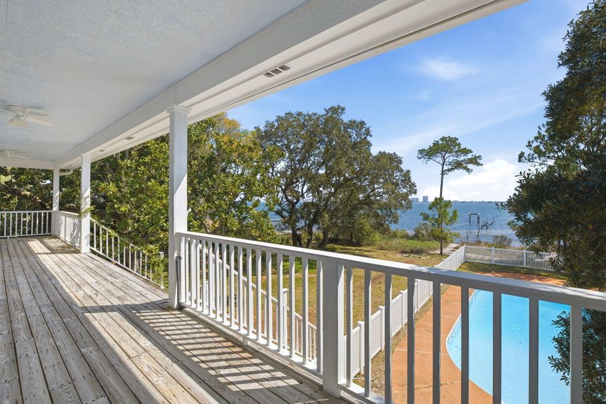 First time ever on the market -- a rare waterfront opportunity on Pompano!Situated on an incredible 3/4-acre waterfront lot with its own white sandy beach, this property offers the kind of setting that is becoming nearly impossible to find. With breathtaking water views, an inground pool, and expansive outdoor living spaces, this home is ready for its next chapter.The home features a newer roof and brand-new windows currently on order and scheduled for installation within the next two weeks, providing peace of mind for the future owner.Inside, you'll find an abundance of natural light pouring through the home along with a kitchen that offers plenty of cabinet space for storage and functionality. Some areas feature hardwood flooring that could easily be refinished to bring back it its original charm.
The main floor layout includes the primary bedroom, dining room, breakfast nook, living room, and laundry room, creating convenient everyday living. Downstairs, you'll find additional bedrooms along with another full bathroom that offers direct access to the pool area, making it ideal for entertaining or guests.

The oversized front porches create a welcoming entrance and provide the perfect place to relax and take in the peaceful waterfront setting.

For those needing space for vehicles, hobbies, or storage, the property includes a true oversized three-car side-entry garage, offering more room than a standard garage.

With no HOA, you'll enjoy the flexibility to bring your boat, camper, or recreational toys home with ease.
This property has incredible potential and is ready for your personal renovation and modern design vision. Whether you're looking to create your dream waterfront residence, a vacation getaway, or a potential Airbnb investment, the possibilities here are endless.

Aside from the upcoming window installation, the home will be sold as-is.
Private tours are welcome, and open house events will be announced soon.
Don't miss this rare opportunity to own a large waterfront property with sandy beach frontage on Pompano.