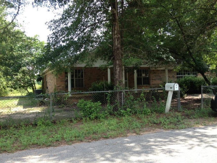 Don't let the age fool you! This home has the all the character of an older home with modern amenities. This all-brick home boasts nearly 2200 square feet of living space with two acres. The interior has been freshly painted in a neutral color scheme that really compliments the brand-new carpets and original wood flooring. The tiled great room is truly great in size and also offers beamed ceilings, a charming window seat, and a dramatic brick fireplace flanked by built-in bookshelves. New countertops have been installed in the kitchen where you'll also find plenty of cabinet space for all your needs. Outside you'll find a covered front porch, enclosed back deck, and a magnificent concrete gazebo, a perfect place to enjoy the pastoral beauty of the country.