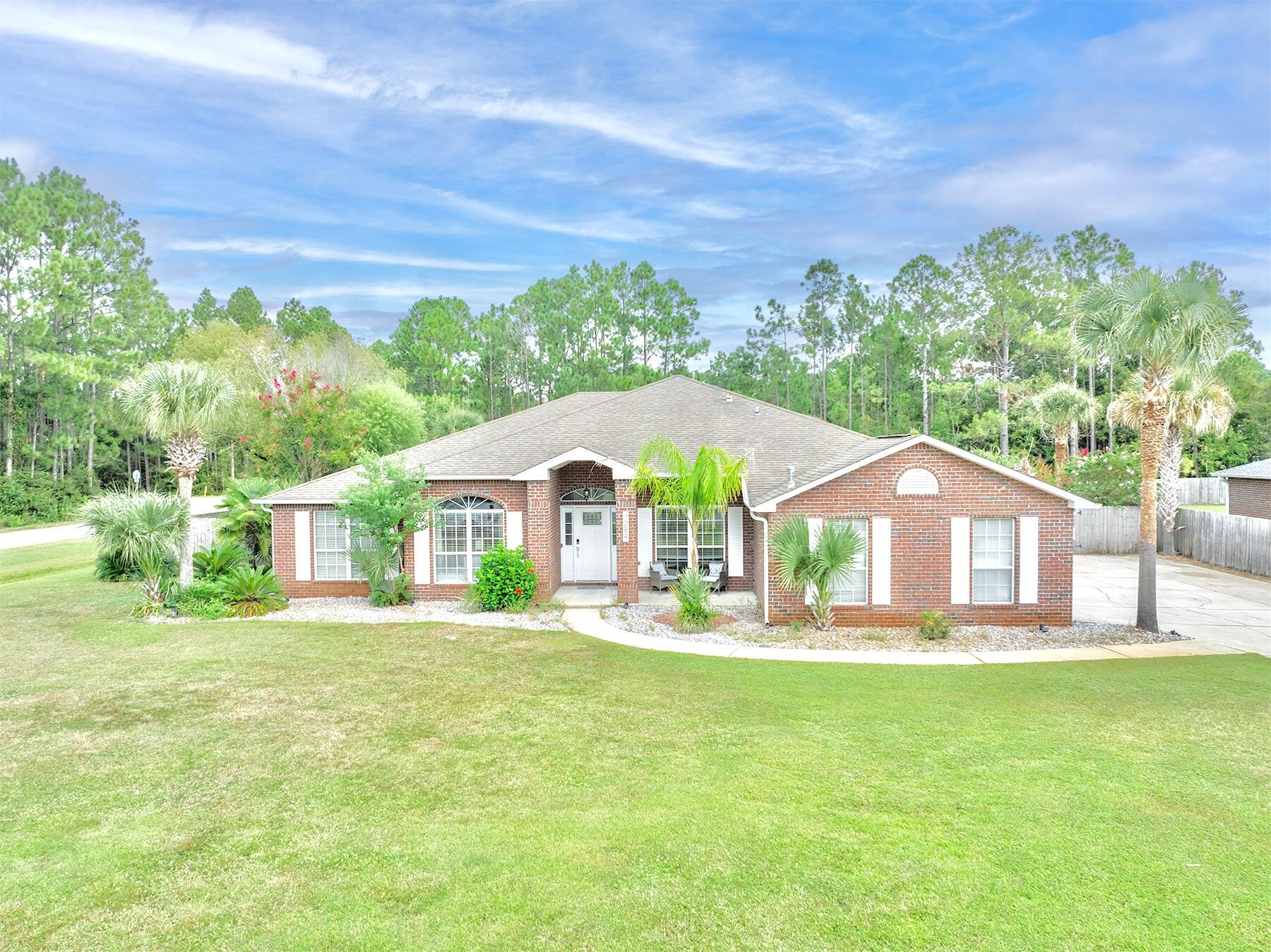 VA Just Appraised at $614,900. Immaculate Pool Home on Large corner lot, almost 3/4 Acre, with full privacy fence, additional inner fence and a full screened-in pool enclosure.  The huge 11 x 17 Office can easily be used as a 5th bedroom, bonus room or even a home movie theatre.  Living room features elegant bamboo flooring, floating entertainment center, recessed lighting and built-in surround sound. Oversized formal dining room sits adjacent to the foyer and kitchen. Easily accommodates 8/10+ people dining arrangements. Ceramic tiled, Full 3-sided kitchen +Plus+ center island with Granite countertops, Gas Range, built-in Microwave, Dishwasher, French Door refrigerator and a cozy 4-person breakfast nook. All this provides the full entertaining/cooking aspect for any size family! Vast 17 x 18 Master bedroom has its own French Doors to the in-ground pool.  Master en-suite features bamboo floors, dual vanities, jetted tub, separate shower and separate water closet plus his and her walk-in closets.  3rd full bathroom has direct access to the pool and oversized laundry room will store all of your essentials.  Just a golf cart drive to the exquisite Hidden Creek golf course.  Enjoy full access to all of the Holley By the Sea amenities as well as top-notch schools. This property is a must see, Contact us directly for a private showing! 