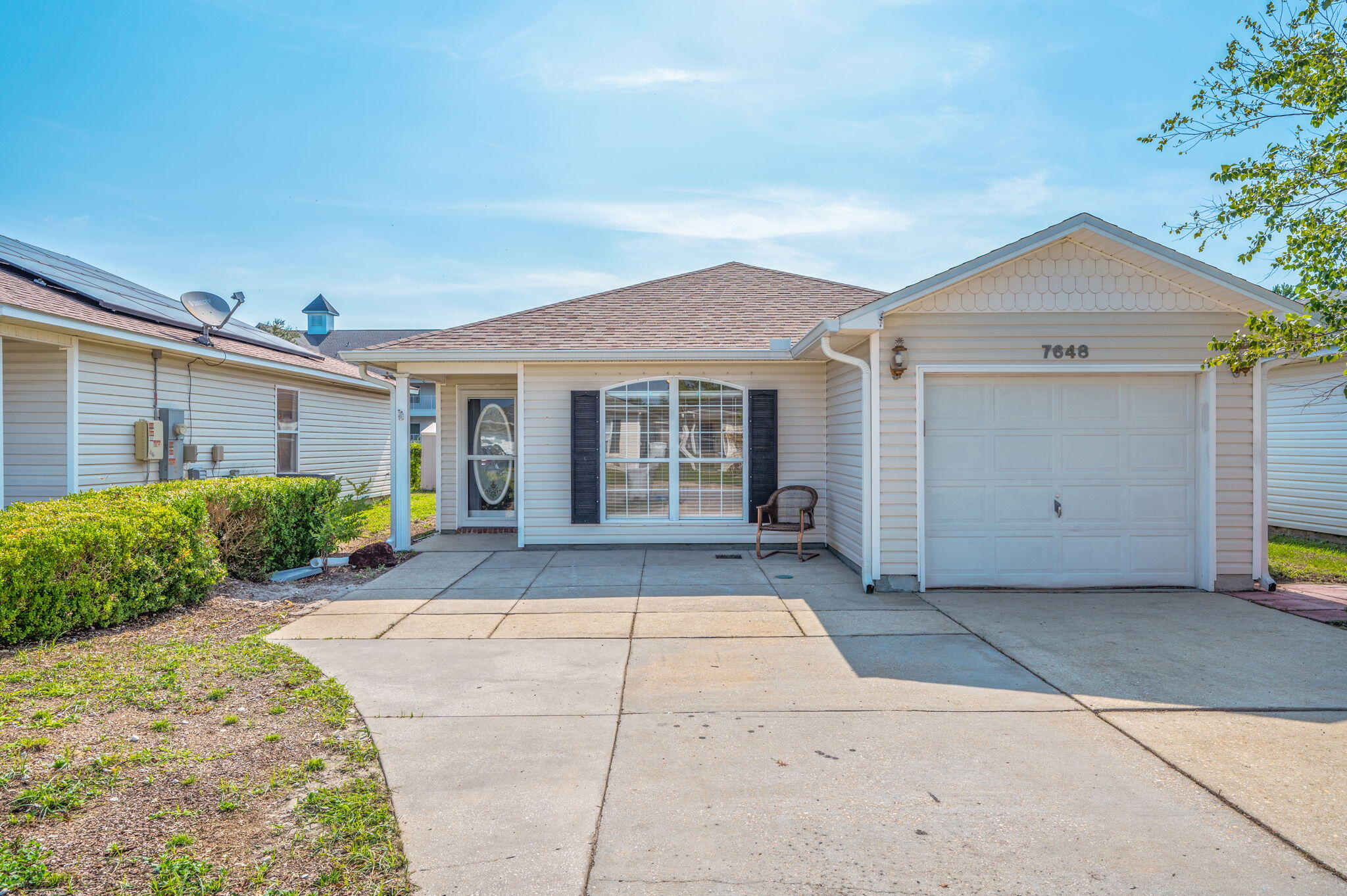 This beautifully maintained single-story home features 3 spacious bedrooms, 2 full baths, and a 1-car garage, perfectly combining comfort and style. Step inside to an inviting open floor plan filled with natural light, luxury vinyl plank flooring, and thoughtful upgrades throughout.The renovated kitchen is a showstopper, offering a large island with bar seating, wood-look tile, stainless steel appliances, and ample space for cooking and entertaining. Enjoy the built-in surround sound speakers, TV wall mount, and seamless flow to the backyard through a sliding glass door.The primary suite is generously sized, complete with a walk-in closet, double vanity, and a soaking tub with shower. Guest bedrooms are bright and comfortable, and the laundry room adds everyday convenience. Out front, a cozy patio welcomes you home, while the fully fenced backyard features a second patio perfect for entertaining, plus a small shed for extra storage. With modern updates, fresh white tones, and thoughtful design throughout, this home is move-in ready and full of charm. Contact us for your showing!