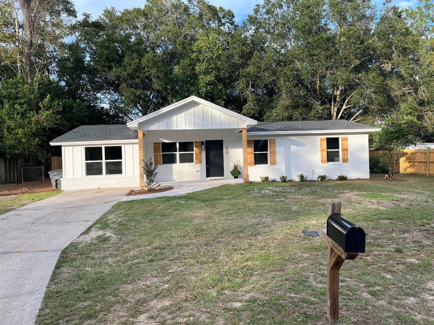 Welcome home to this beautifully remodeled brick-rancher conveniently located nearby to Eglin AFB, schools, shopping and parks. Curb appeal and outstanding design inside; fully updated 4 bedrooms/3 bathrooms...two master bedrooms have en-suite bathrooms.  The split bedroom floor plan offers an open kitchen, and two living areas. The kitchen has plenty of crisp white cabinets, topped with classic quartz countertops and finished with black accents & gold hardware. The large sink has a stunning black and gold faucet, a window that overlooks the magnificent oak in the backyard.  The home has warm, wood look LVP flooring throughout the living spaces. Each bathroom has beautiful finishes, but the new en-suite walk-in shower with frameless glass doors & fancy tilework steals the show! read MORE