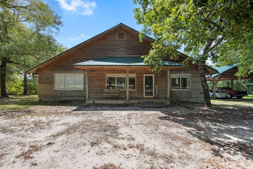 Discover the charm and serenity of this amazing log cabin home, beautifully situated on 20 lush acres of private land. Located just a short drive from Defuniak Springs, this property offers the perfect balance of seclusion and accessibility. The home features 3 spacious bedrooms upstairs, each designed for comfort and relaxation. With 4.5 bathrooms, including 3 en-suites and an additional full bath downstairs, you'll find ample convenience for family and guests. The lower level boasts two large bonus living areas, offering versatile spaces for a variety of uses, from a home office to a game room. Step outside to enjoy the expansive outdoor space, complete with a tranquil pond stocked with bream and plenty of room for outdoor activities. The log cabin design provides a warm, inviting atmosphere, while the large outdoor area with both upstairs and downstairs access allows for easy enjoyment of the beautiful surroundings.
Experience the peaceful charm of country living with modern comforts just a stone's throw away. Schedule a visit today to explore this exceptional property!