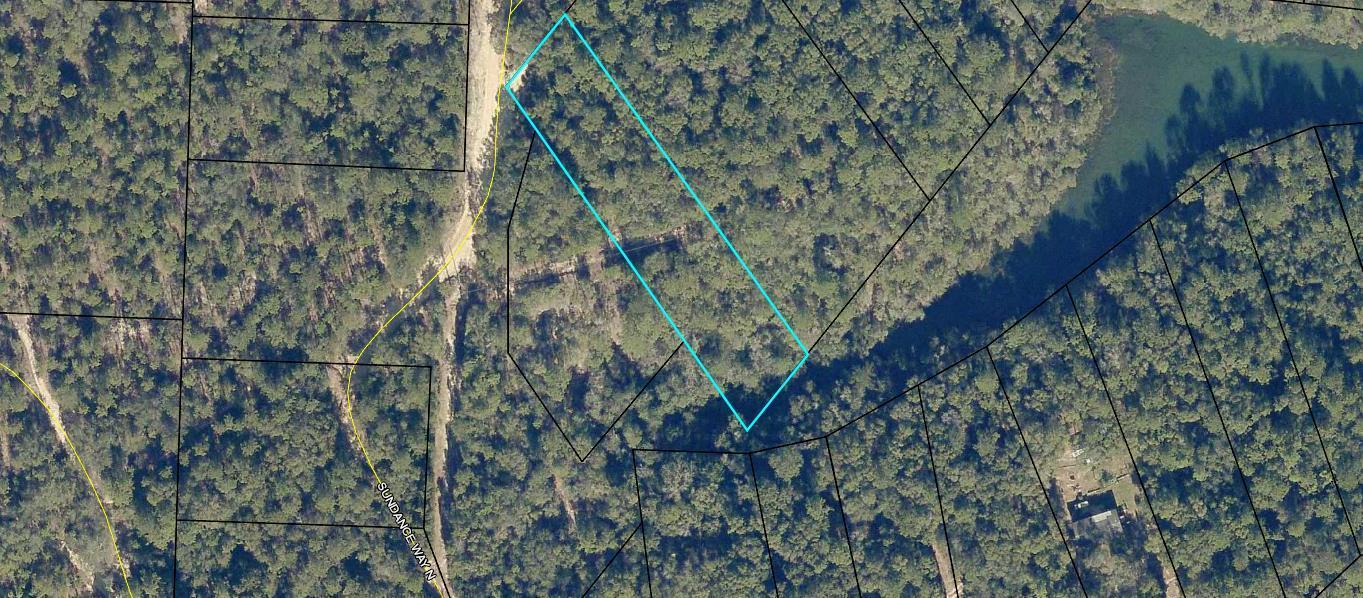 A hidden find that borders Little Blue Lake Looking for a place to escape - here is a chance for your weekend retreat. Adjacent lots available as well. Buyer to verify all information.