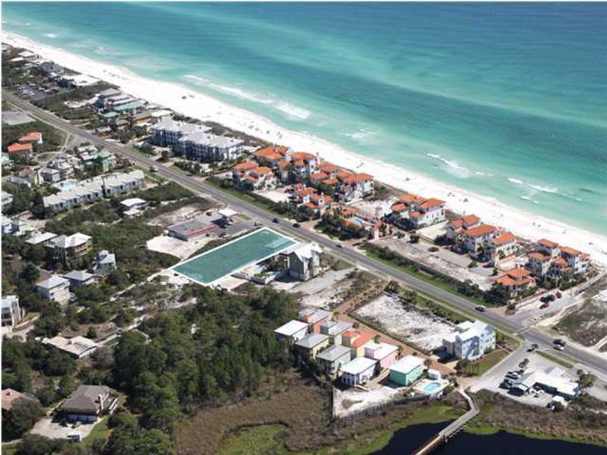 .58 Acres of prime vacant land fronting 30A in Dune Allen Beach. Property is zoned as residential or commercial. A conceptual site plan for a residential townhome community can be viewed in photos, or build up to 6000 square feet of commercial office space.