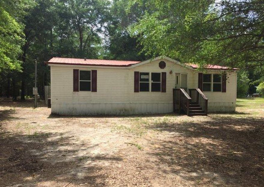 REO ~ 1 Acre provides plenty of privacy but not too far from town. Seller does not have title to the mobile home. Buyer will be required to sign a hold harmless at closing acknowledging their is no title to the mobile home. This property is eligible under the Freddie Mac First Look Initiative through June 14, 2017.