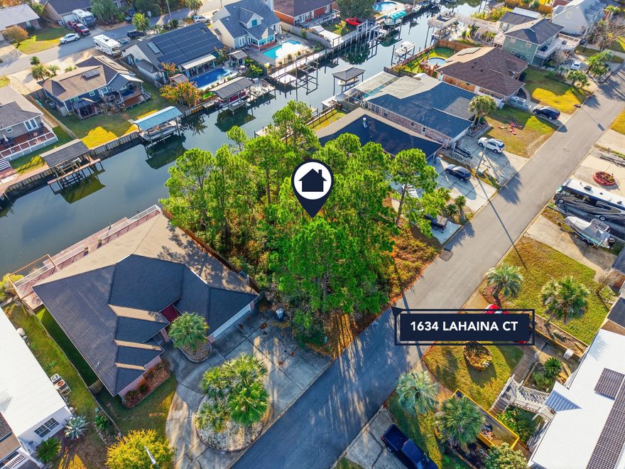 Canal-front vacant lot located in the desirable Polynesian Island community of Gulf Breeze. Conveniently situated near shopping, dining, and the white-sand beaches of Pensacola Beach, this property offers an ideal setting for your next build. Featuring approximately 70 feet of canal frontage, the lot is ready for its next stage of development--perfect for boating enthusiasts and coastal living.