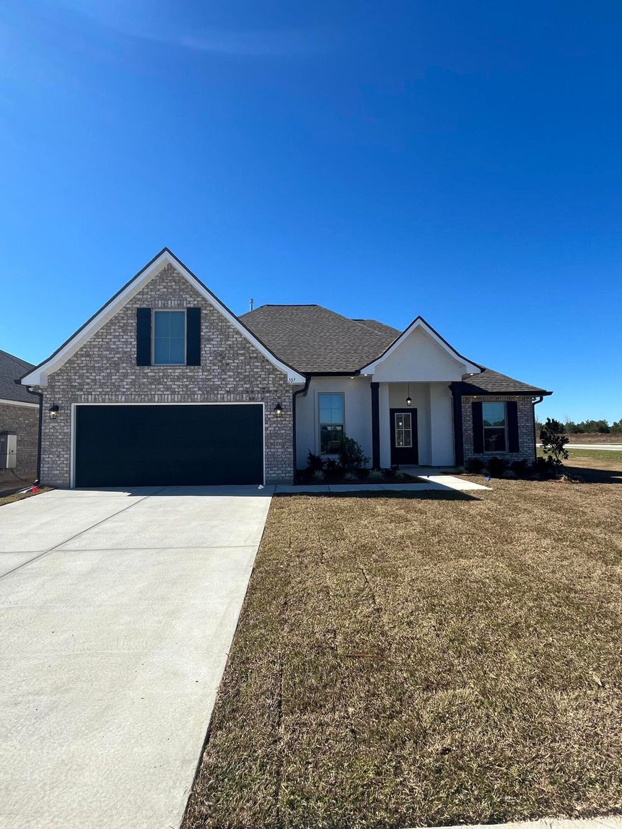 Located on a corner lot, the ROSES V B in The Bluffs at Lafayette community offers a 3BR, 2BA, open and split design with flex space and computer desk/niche. Upgrades added (list attached). Special Features: double vanity, garden tub, separate shower, and 2 walk-in closets in master bath, tray ceiling in master bed, kitchen island, walk-in pantry, covered porches, undermount sinks, LED lighting throughout, crown molding, ceiling fans in living and master, custom framed mirrors in all baths, landscaping, architectural 30-year shingles, flood lights, and more! Energy Efficient Features: tankless gas water heater, gas kitchen appliance package, vinyl low E windows, and more! Energy Star Partner.