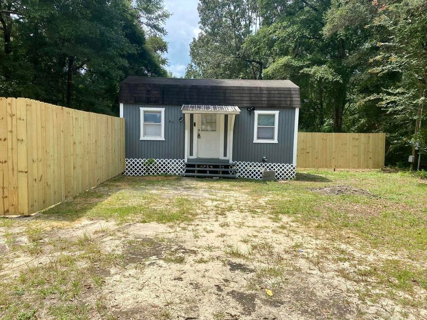 Tiny house living studio style with a kitchen and  new bathroom. Pets are not allowed and utilities are included up to $150 per month. The rental is only for the front part of the lot to the privacy fence. It does not include the back half of the lot or the RV. Restrictions apply- you must have a 600 credit score or better, one year on the job, and income of $1750 per month.