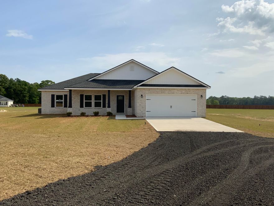 ROOM TO ROAM IN THIS ''TO BE BUILT'' NEW HOME-1.75 acres -All brick construction with cozy front porch and covered rear porch. Open floor plan boasts raised ceilings with recessed lighting thru-out, ceiling fans in all bedrooms and living room. Foyer leads you to family/kitchen/dining area, kitchen has white shaker style cabinets, work island with bar seating, pantry and dining area, quartz or granite countertops, owners suite is located right off kitchen & has double vanities, shower and walk-in closet in bath, laundry room, mud room. Additional bedrooms are good size, additional bath has double vanities as well. Luxury vinyl plank in all common areas, carpet in bedrooms. Home can be completed 90 days from acceptable contract, call for details on seller contributions.